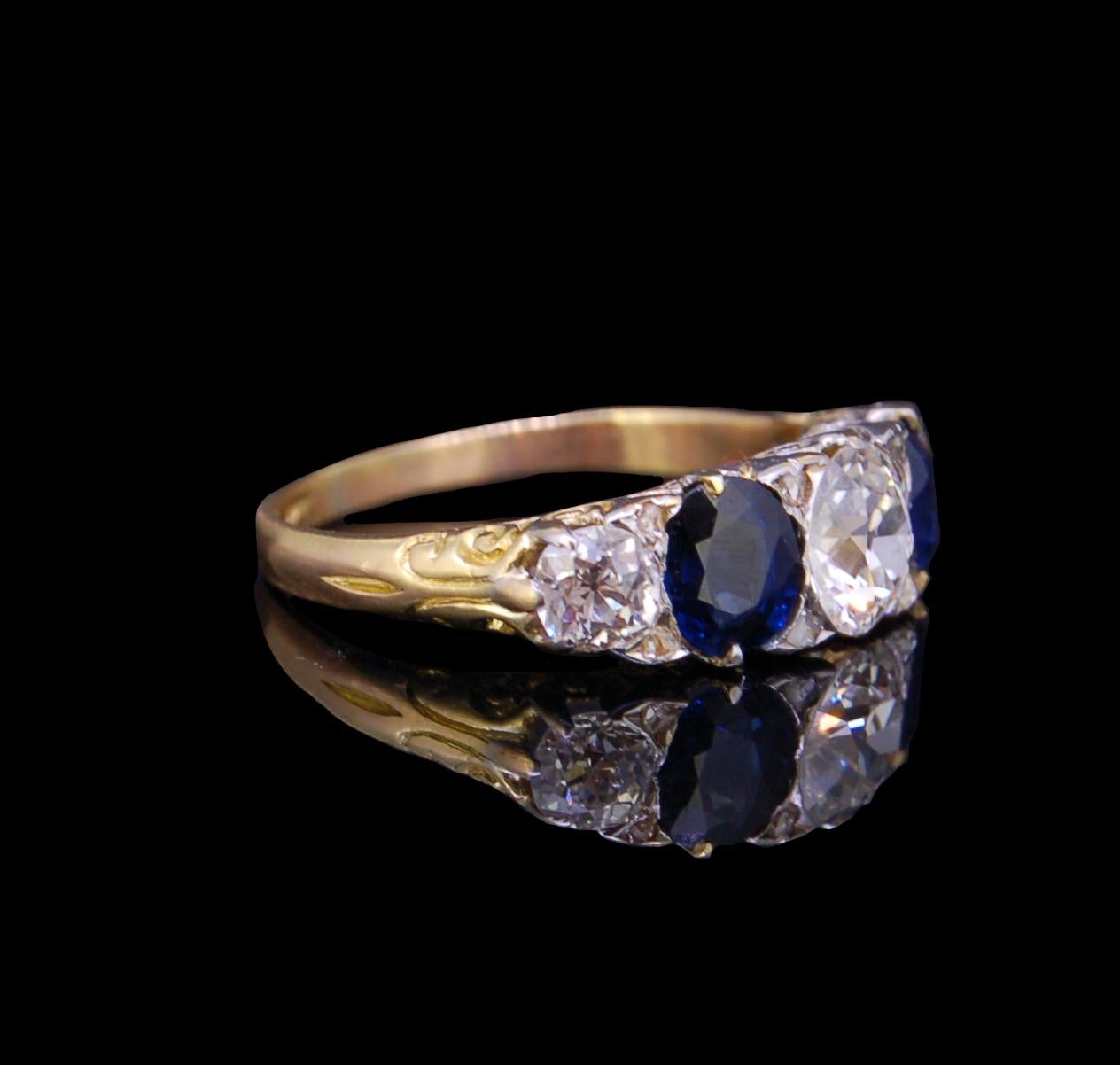 SAPPHIRE AND DIAMOND 5-STONE RING, set with 3 diamonds totalling 1.32 ct. (center 0.80 ct. sides 0.26 ct). and 2 blue sapphires totalling approx. 1.46 ct. (approx. 0.73 ct each.) Size N1/2 3.5 grams.