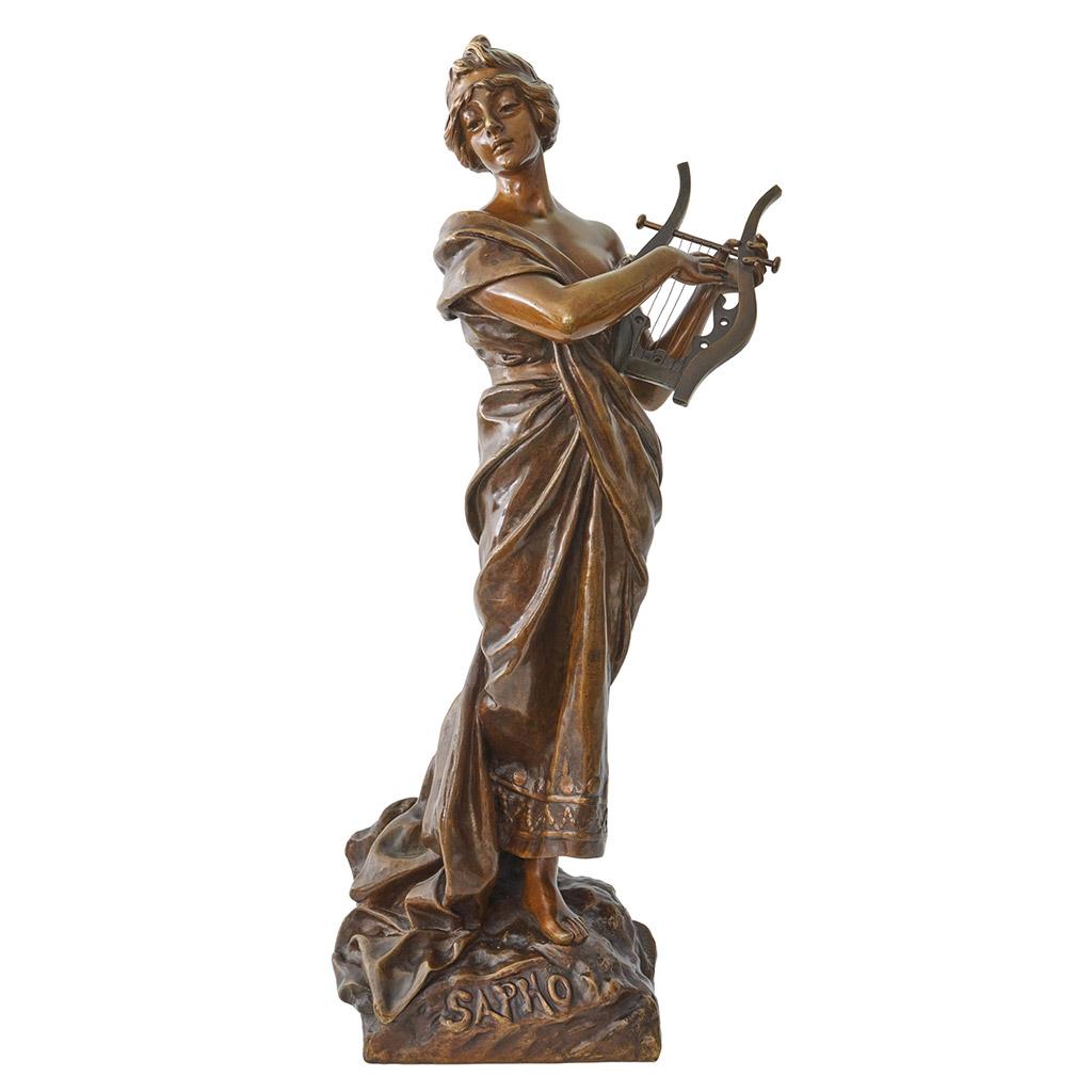 Sapho A large Art Nouveau sculpture by Emmanuel Villanis of Sapho playing her lyre, with her loose fitted garment falling at her feet. Labelled 'Sapho' and signed 'E'Villanis' to bronze. Numbered 3915 with foundry stamp to back. 

Literature: