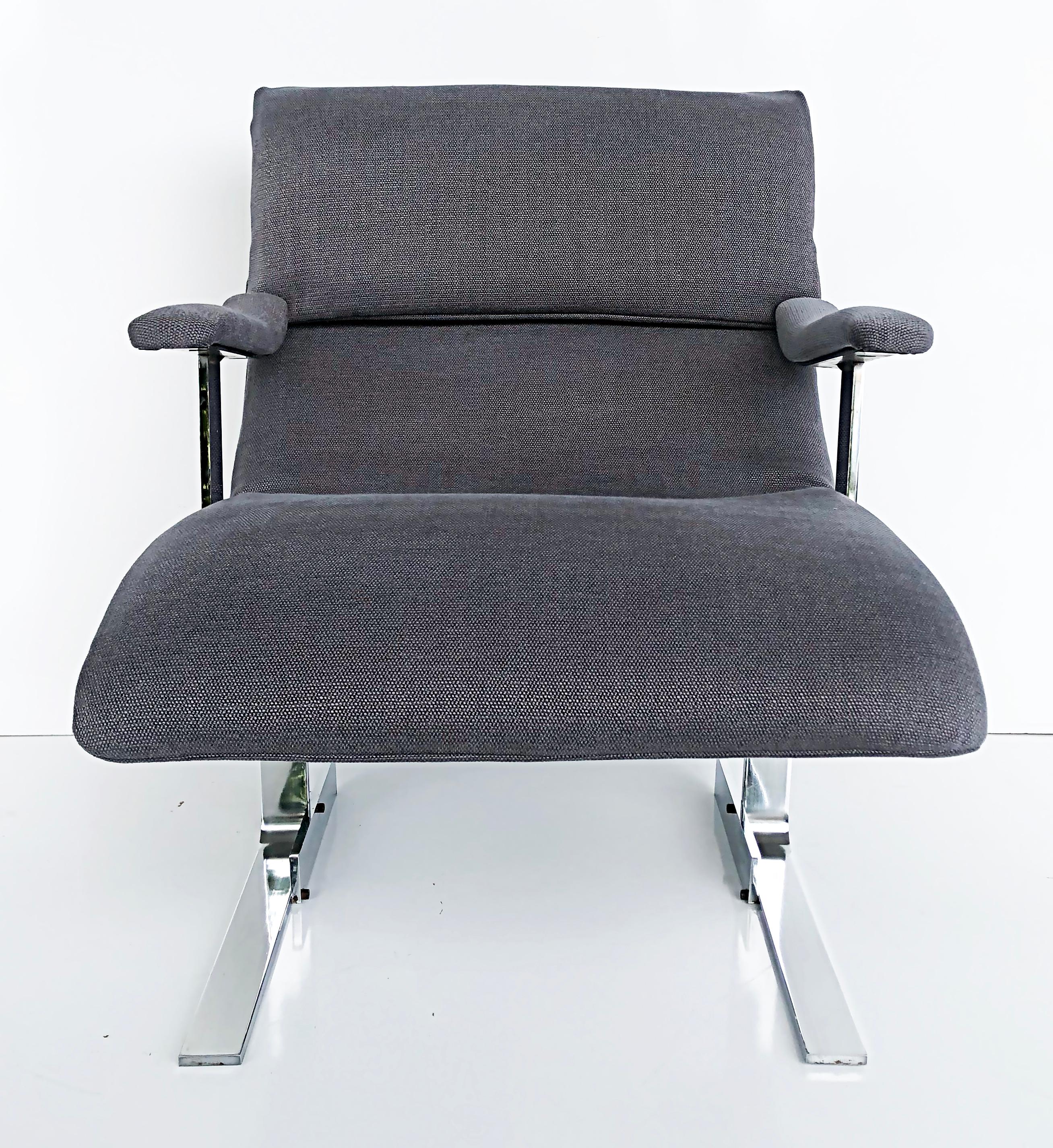 Saporiti Italia Attributed Club Chairs, New Kravet Upholstery

Offered for sale is a pair of club chairs that have been newly upholstered with Kravet fabric. These substantial stainless steel club chairs are attributed to Saporiti Italia.  Arm