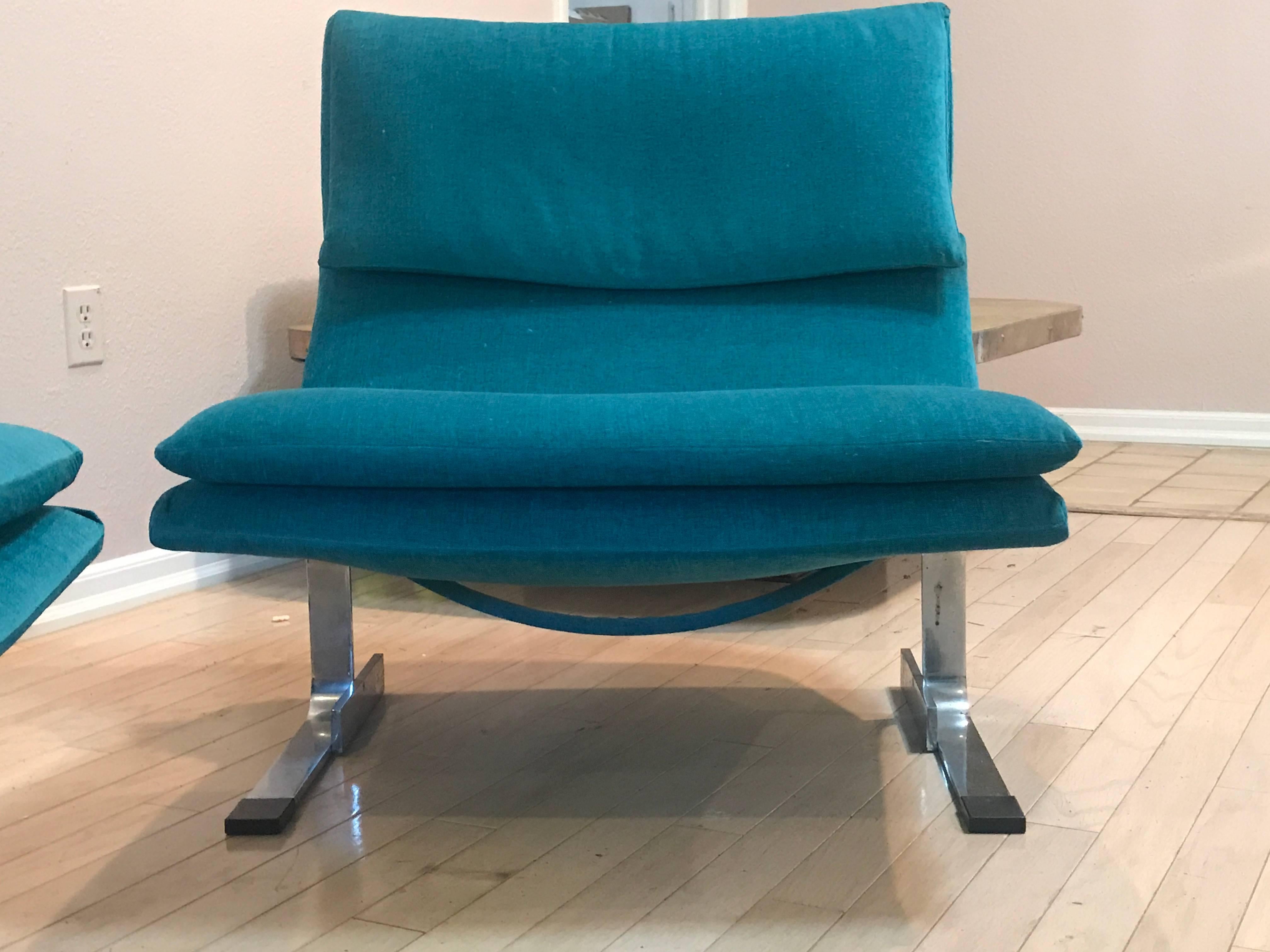 Restored entirely with new cushions and entire new fabric upholstery. Most delicious and comfortable chairs for a sitting room in a sleek 1970s chrome base that upscales any room.