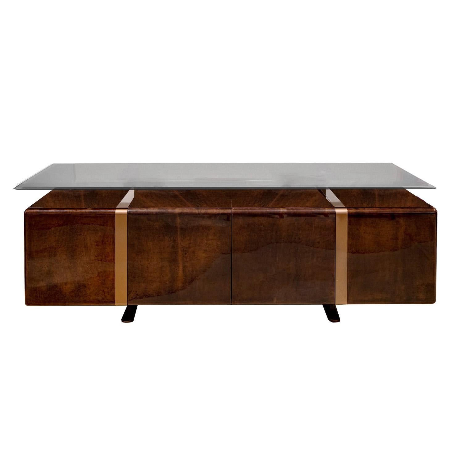 Impressive and large credenza in luxurious lacquered dark brown goatskin and bronze with floating bronze glass top by Saporiti, Italian 1980's. The craftsmanship of this piece is superb. The floating glass top makes it perfect as a server.