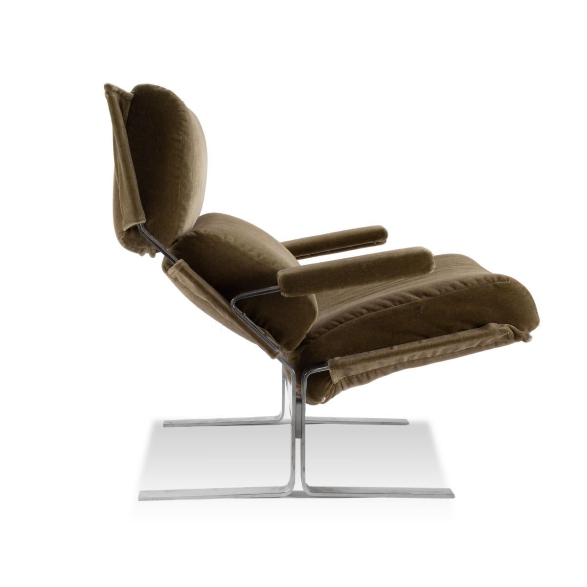 A Saporiti lounge chair with matching ottoman by Richard Hersherger for Saporiti, Italy, circa 1970.

Features a polished chrome frame with taupe velvet upholstery. 

Measures: Seat height 18.5 inches
Ottoman Dim: 28 x 23 x 15.