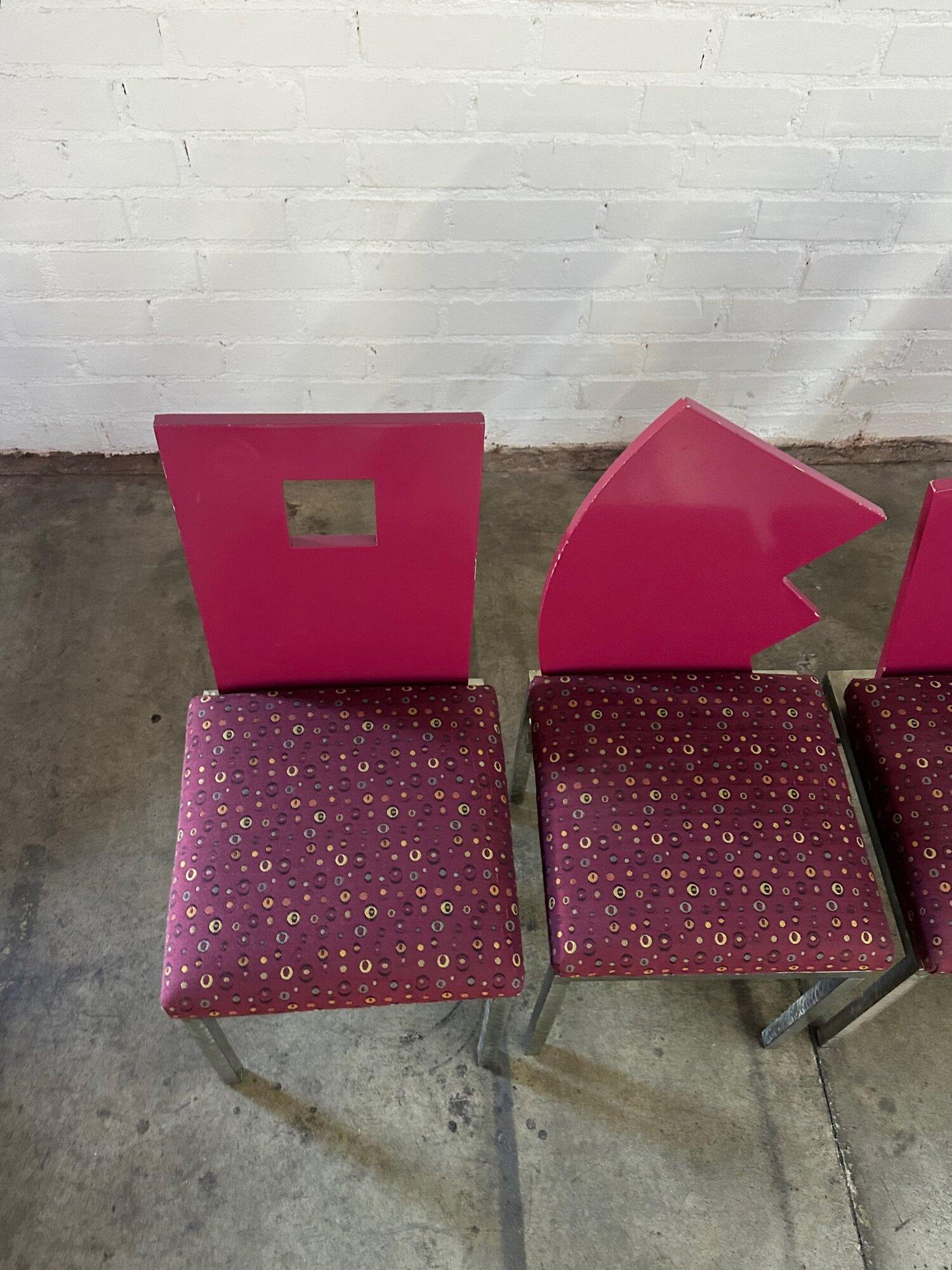W17 D18 H36 SW15.5 SD16 SH18.5

Post Modern Dining Chairs in the the style of Saporiti. Each chair features a different shape back in a lacquered dark magenta, with a magenta patterned upholstered seat. Chair frames are made out of sturdy metal.