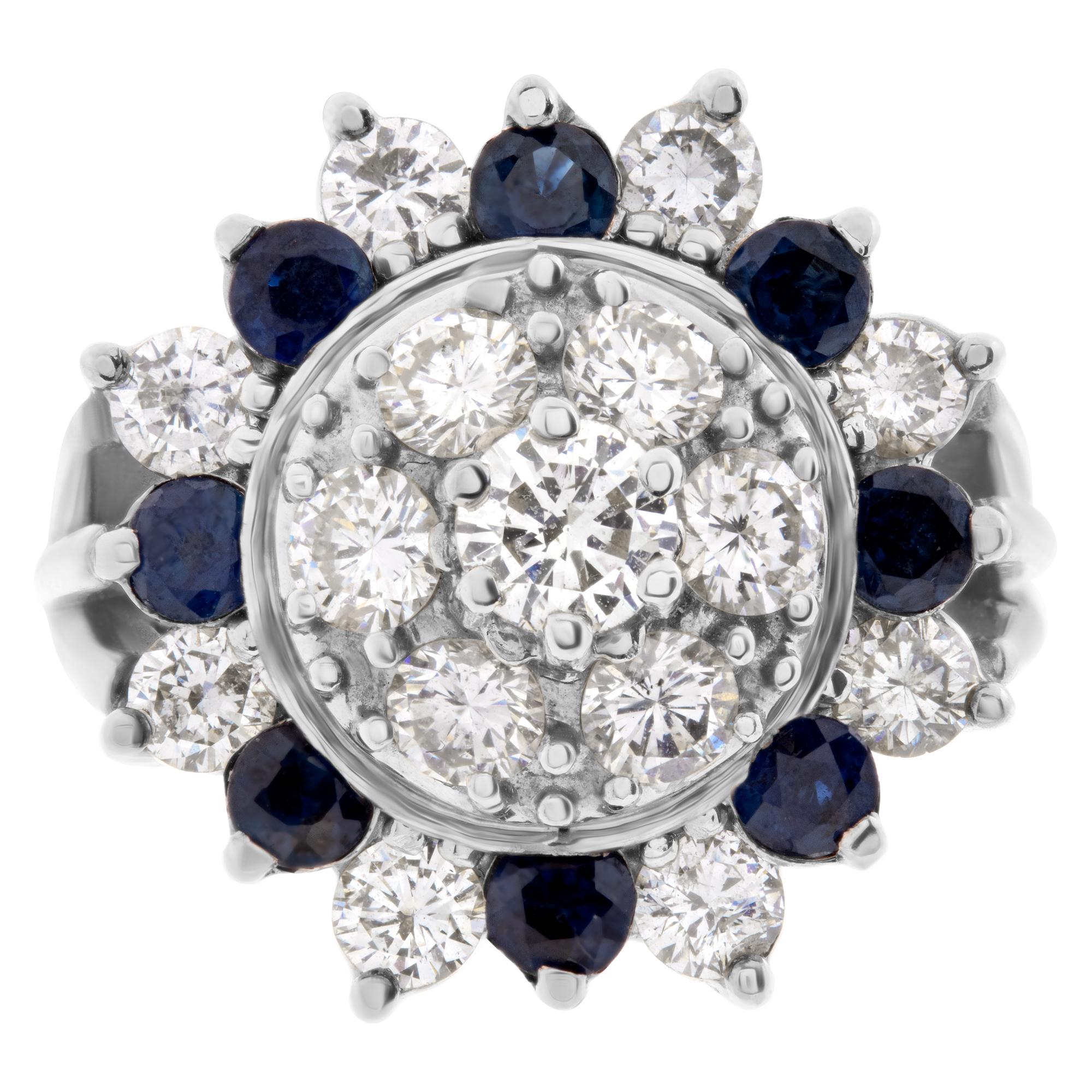 Star cluster ring with approx. 1.50 carats in diamonds and 0.50 cts in blue sapphires set in 14k white gold (SI clarity). Size 6.5  This Diamond ring is currently size 6.5 and some items can be sized up or down, please ask! It weighs 6.4