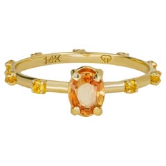 Peach gemstone 14k gold ring.