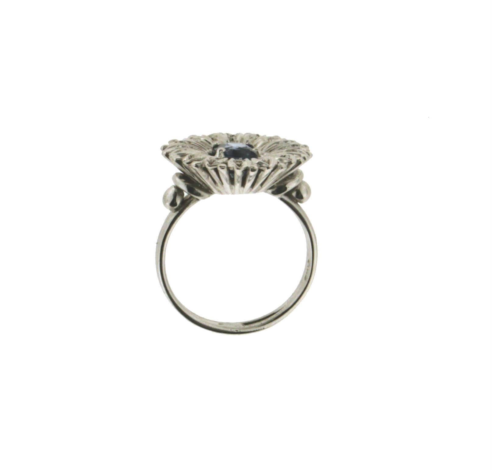 Sapphire white gold 18 karat diamonds cocktail ring 

Ring weight 7.30 grams
Ring size 13.50 ITA 6.75 U.S