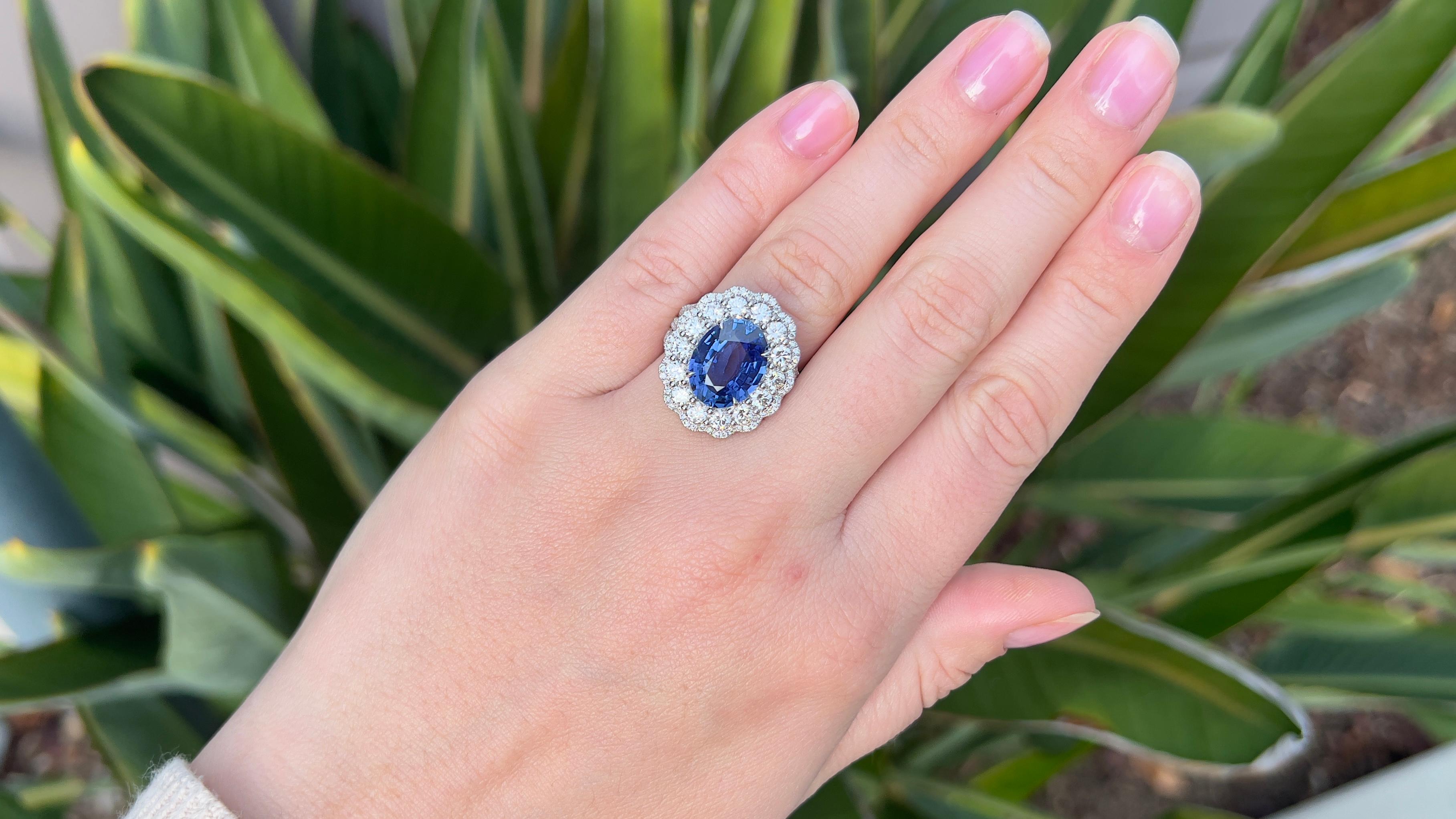 Sapphire = 5.83 Carat 
Cut: Oval
112 Round Diamonds = 2.45 Carats
( Color: F, Clarity: VS )
Metal: 18K Gold
Ring Size: 6.25* US
*It can be resized complimentary