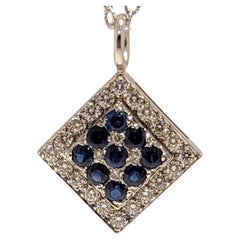 Sapphire '9=1.90cts' and Diamond '24=0.59cts' 18k White Gold Pendant
