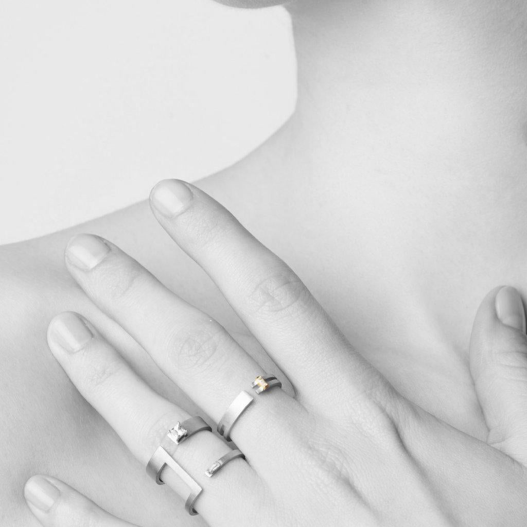Unfinishing Line collection exudes minimalism and precision with its smooth lines and angles. Detail with a clear sapphire and cut out details. 
Double Lines Sapphire Ring is perfect for day to night wear due to the simplistic neat design which can