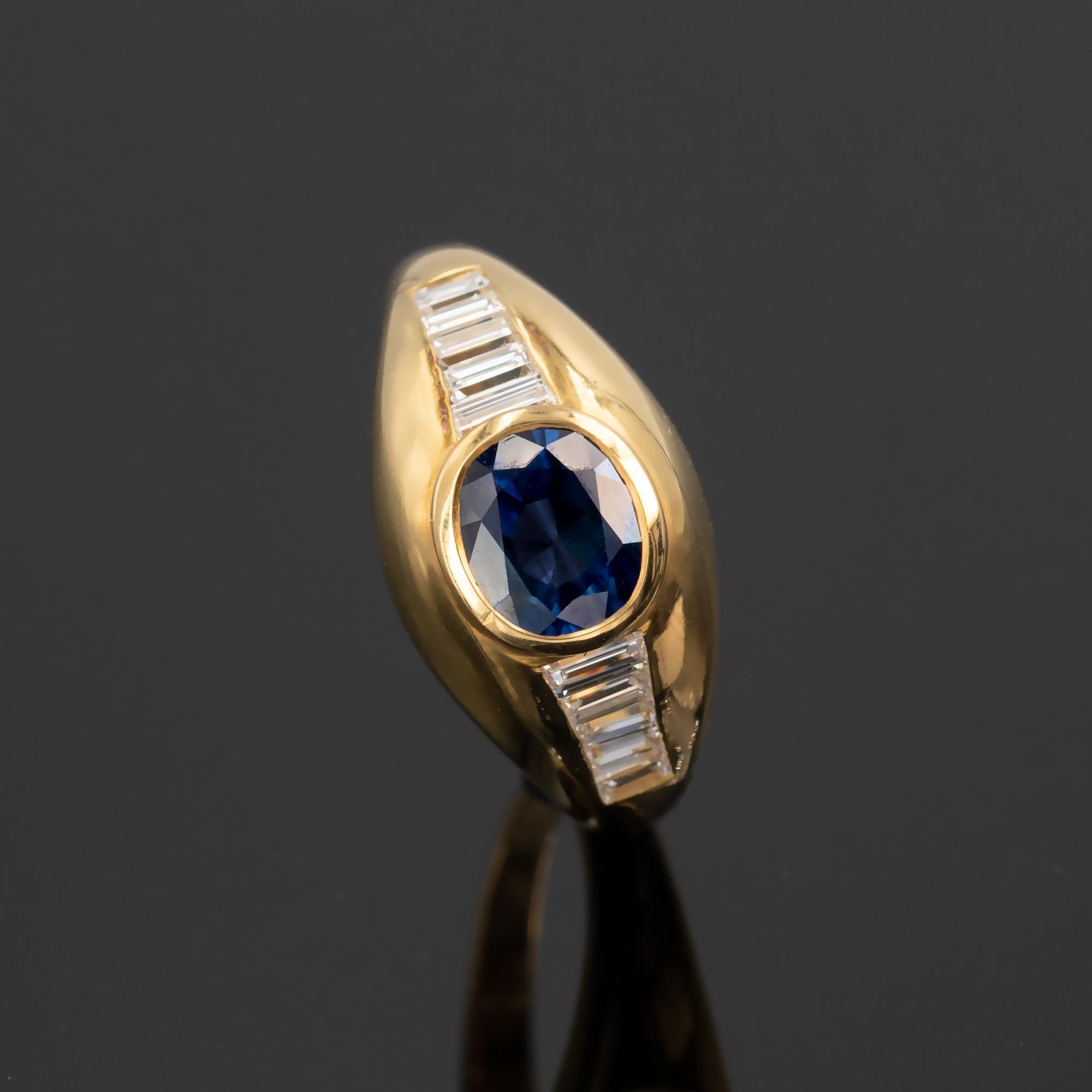 Contemporary Sapphire and Baguette Cut Diamonds 18Kt Gold Ring For Sale