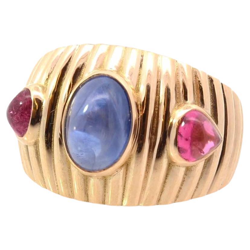 Sapphire and cabochon tourmaline ring in gold For Sale