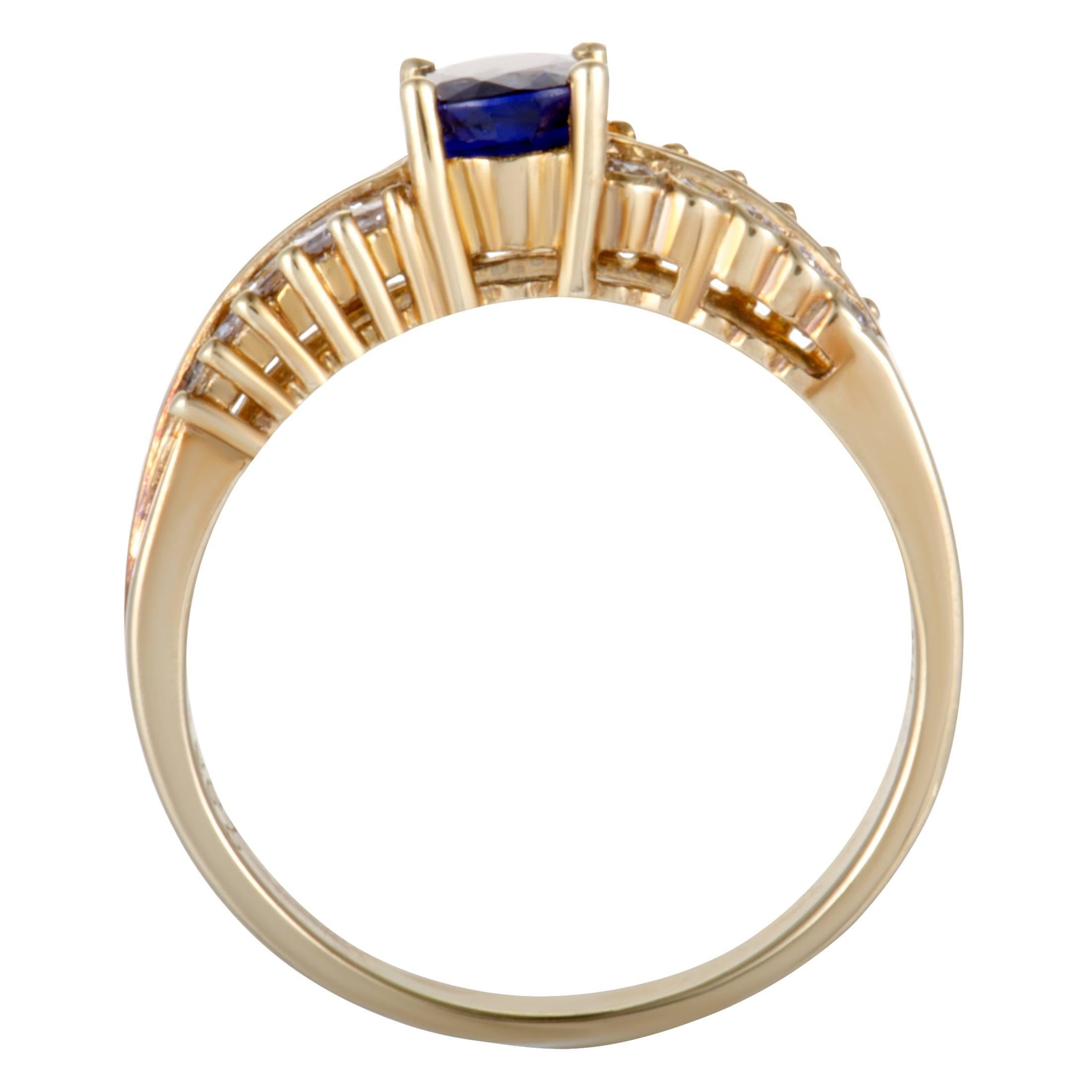 The very essence of prestigious excellence is embodied in this sumptuous ring that features a compellingly classy design and is made of luxurious 18K yellow gold. The ring is set with diversely cut diamond stones that amount to 0.56 carats and