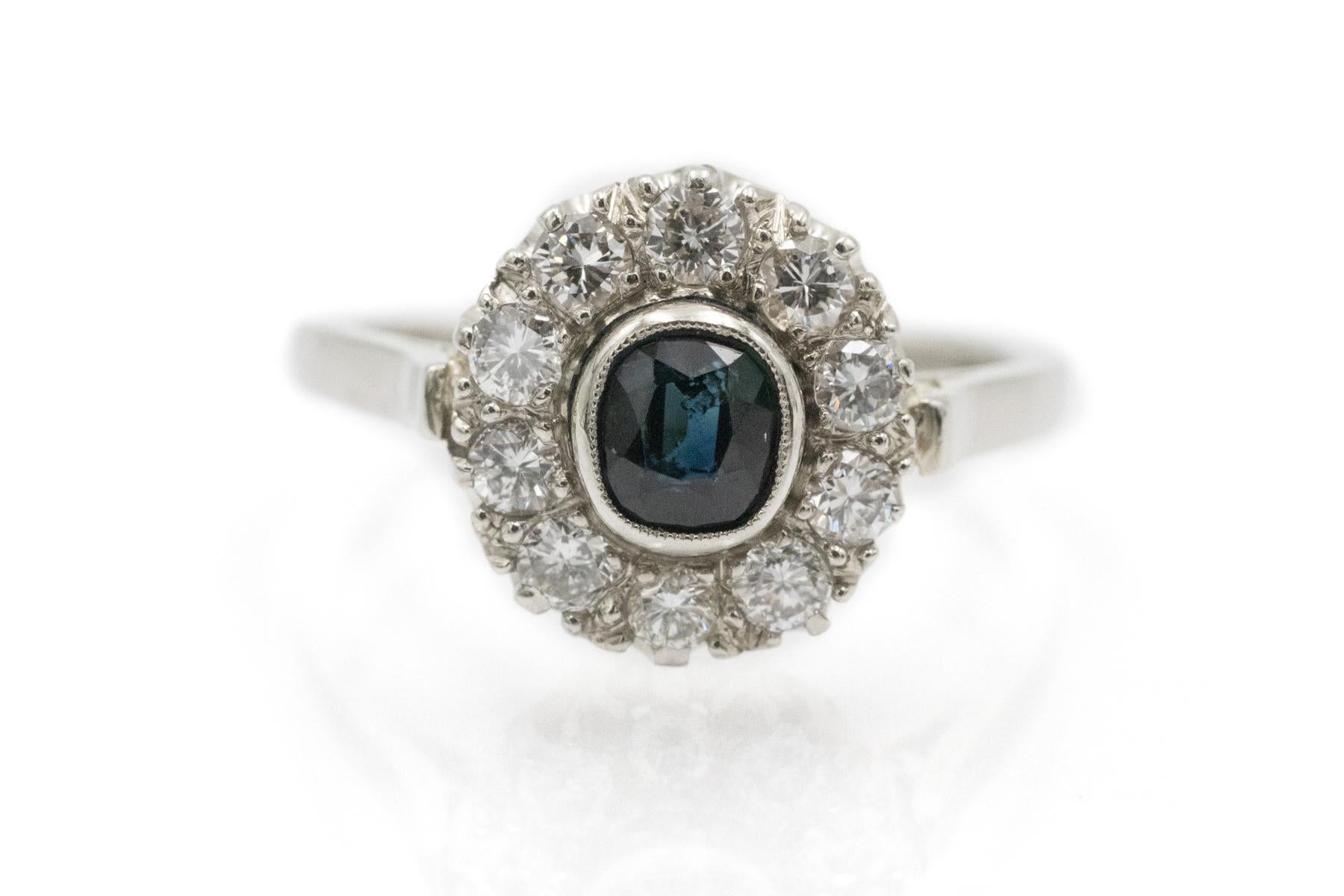 A vintage ring with a sapphire and diamonds - a beautiful classic style

Origin: Austria, with the hallmark for 585 gold used since 1925.

The ring is made of 14-karat white gold (0.585 fineness).

The ring features a beautiful, deep blue sapphire