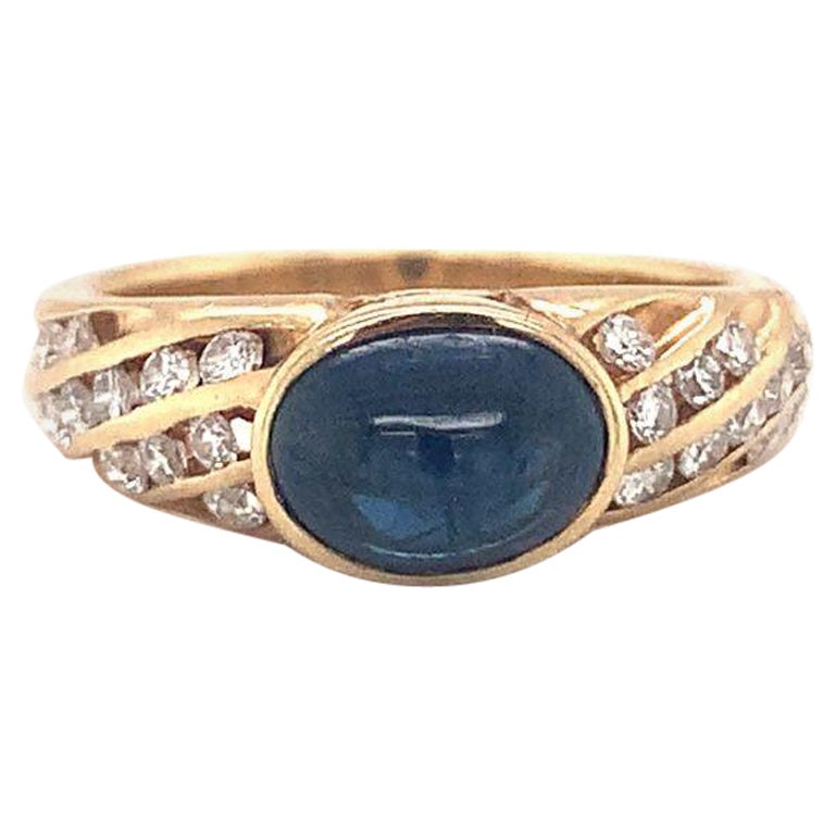 Anello con zaffiro e diamante in oro giallo 14k, circa anni '70