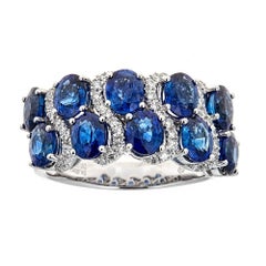 18 Karat White Gold Oval Cut Blue Sapphire Diamond Band Ring
