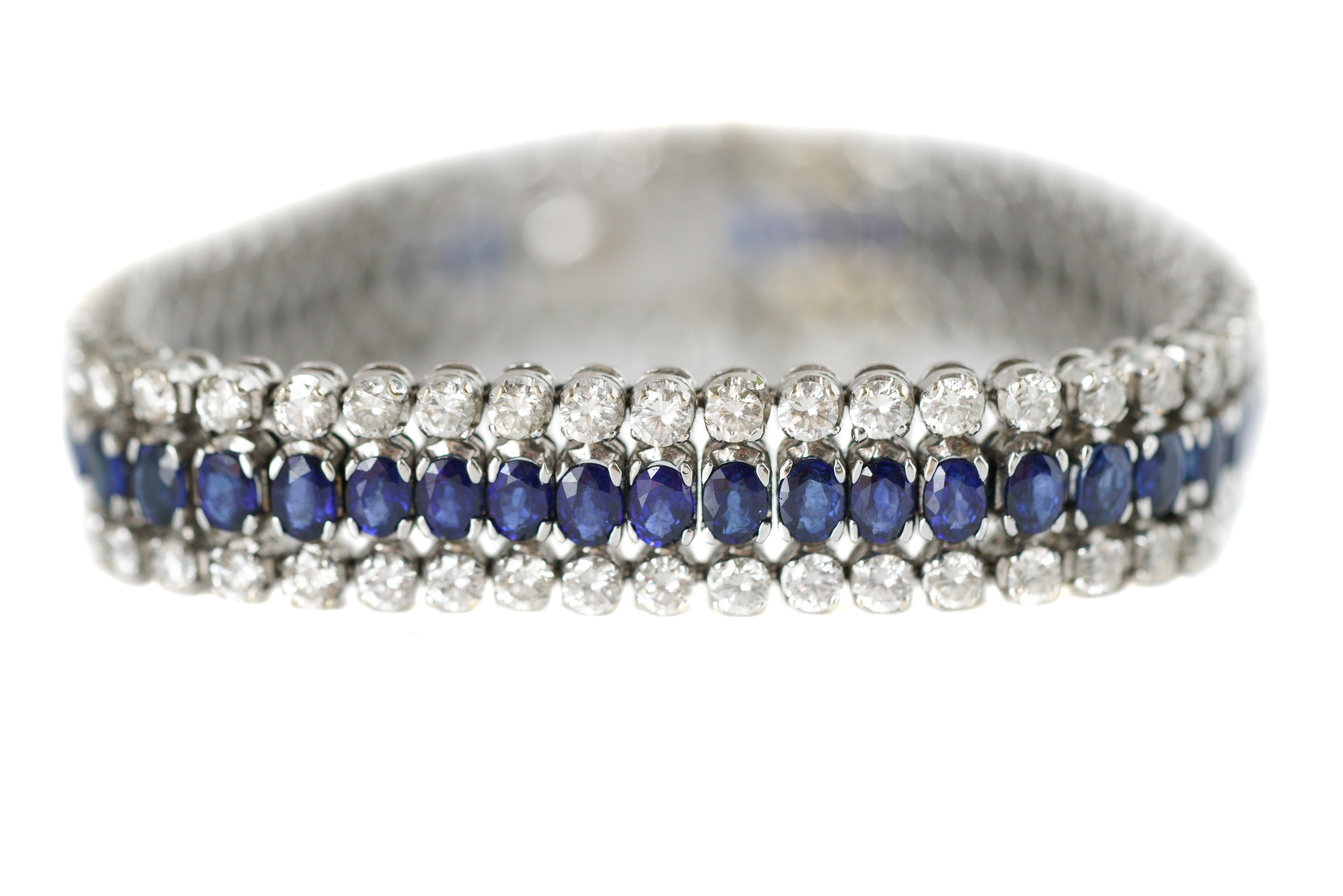 This Brand New, Never Worn exquisite Sapphire and Diamond Link Bracelet features:

10.6 carat total Oval cut Deep Blue Sapphires
6.36 carat total Round Brilliant Diamonds
All crafted in 18 karat White Gold Bracelet

Box Clasp with 2 Safety Clasps
