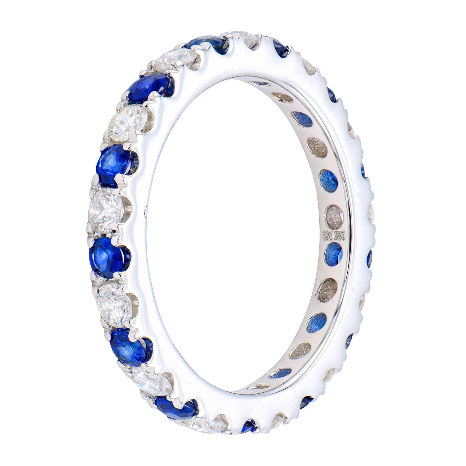 Bands are a staple piece of jewelry that can be dressed up or down to go with everything! This band has 13 sapphires totaling 0.70 carats and 13 VS2 and G color diamonds totaling 0.60 carats which alternate to create a classic look. The stones go