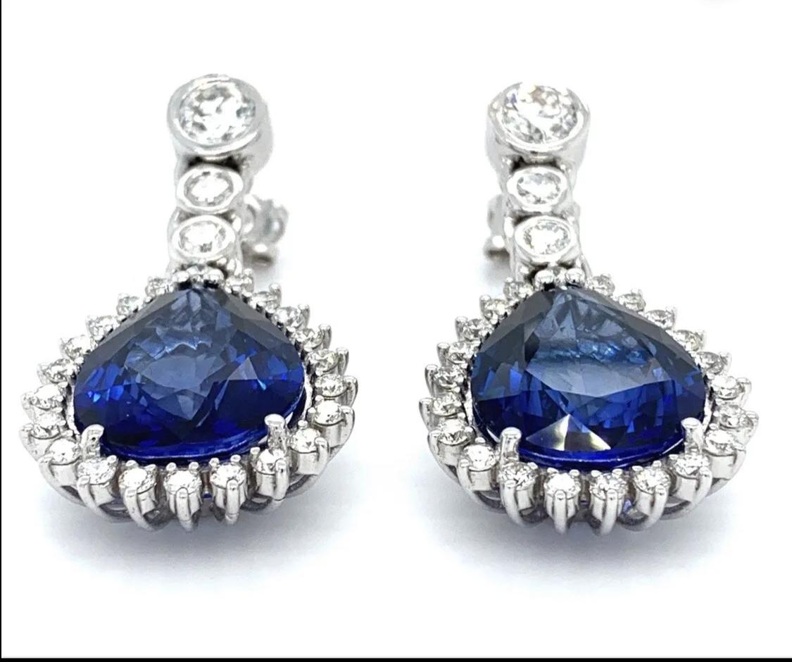 Sapphire and diamond art deco drop earrings 18k white gold 
Sapphire pear shaped and diamond cluster drop stud earrings 18k white gold
Sapphire treated total weight 1.40ct 
Diamonds 2.40ct F colour VS1 clarity
Hallmarked
Measuring approximately