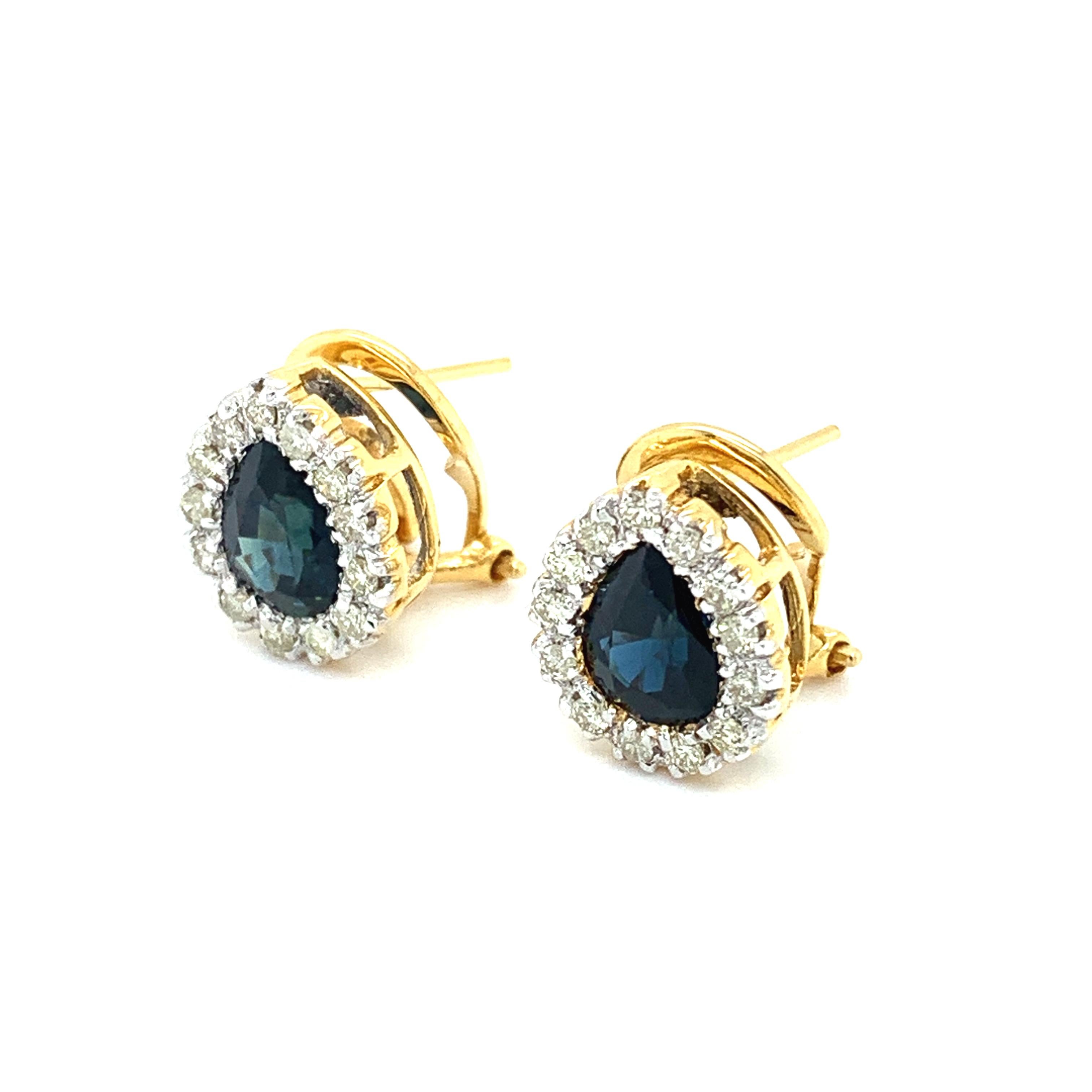 Sapphire and diamond halo art deco post and clip earrings in 18k yellow gold
Sapphire pear shaped gemstone total weight 2.00ct
Diamond round brilliant cut total weight 0.96ct F colour VS1 clarity
Hallmarked
Measurements length approximately 14mm