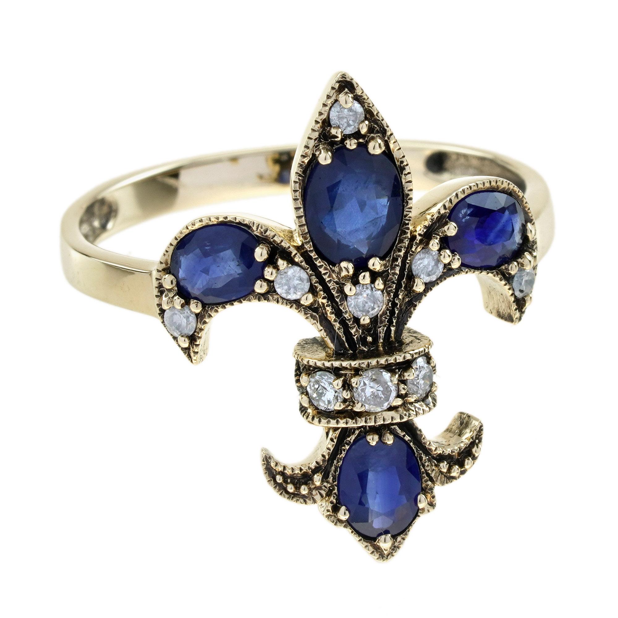 This Art Deco-style Fleur-De-Lis ring features a central sapphire, symbolizing a lily, surrounded by diamonds placed above the middle, left, and right sapphires. The design is enhanced by intricate rope-like details, reminiscent of a floral bouquet