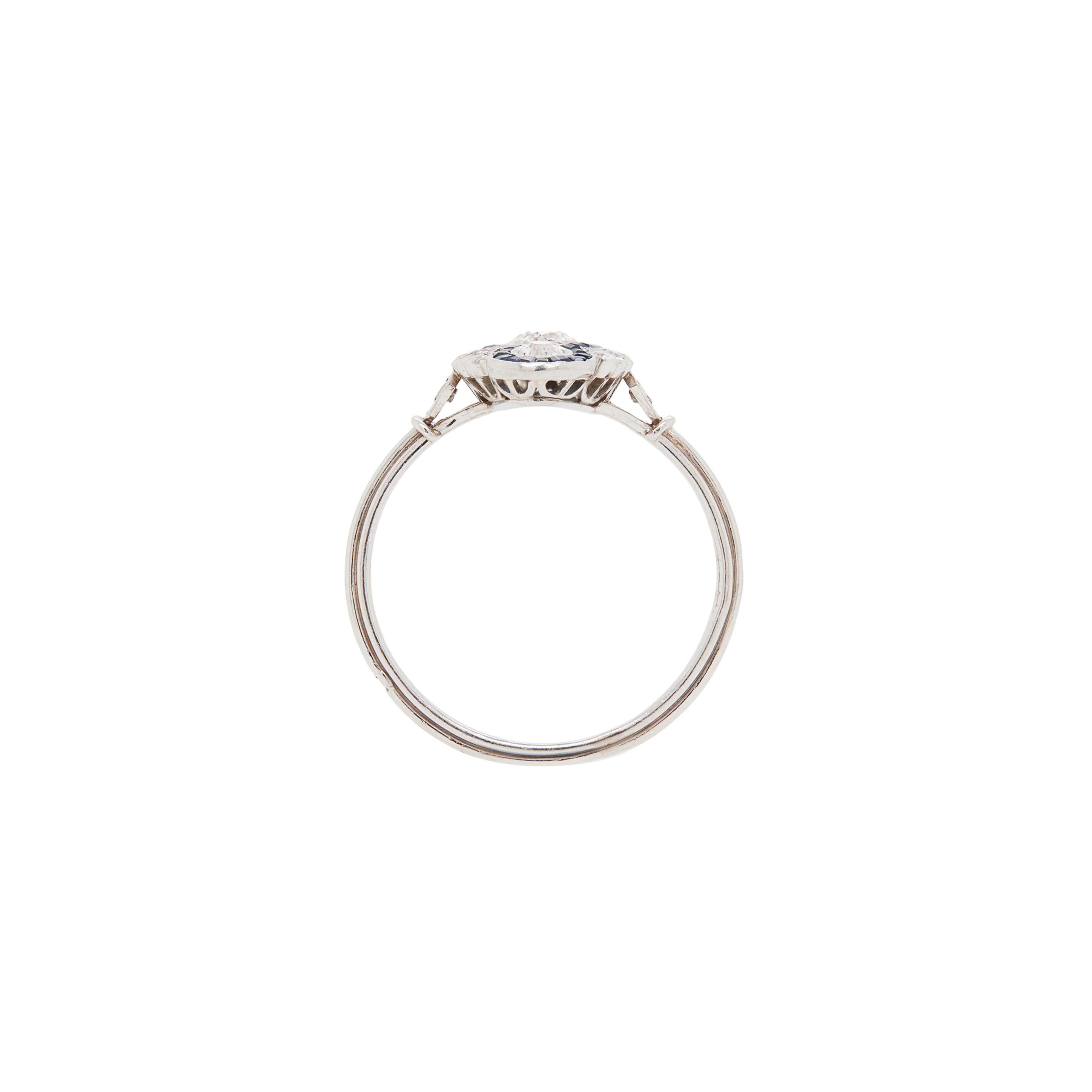 Introducing a sensational navette style ring, excellently crafted in luxurious platinum.

A fantastic reproduction of an Art Deco style piece, this stunning ring feels as exquisite as it looks. The ring features an exquisite structural design,