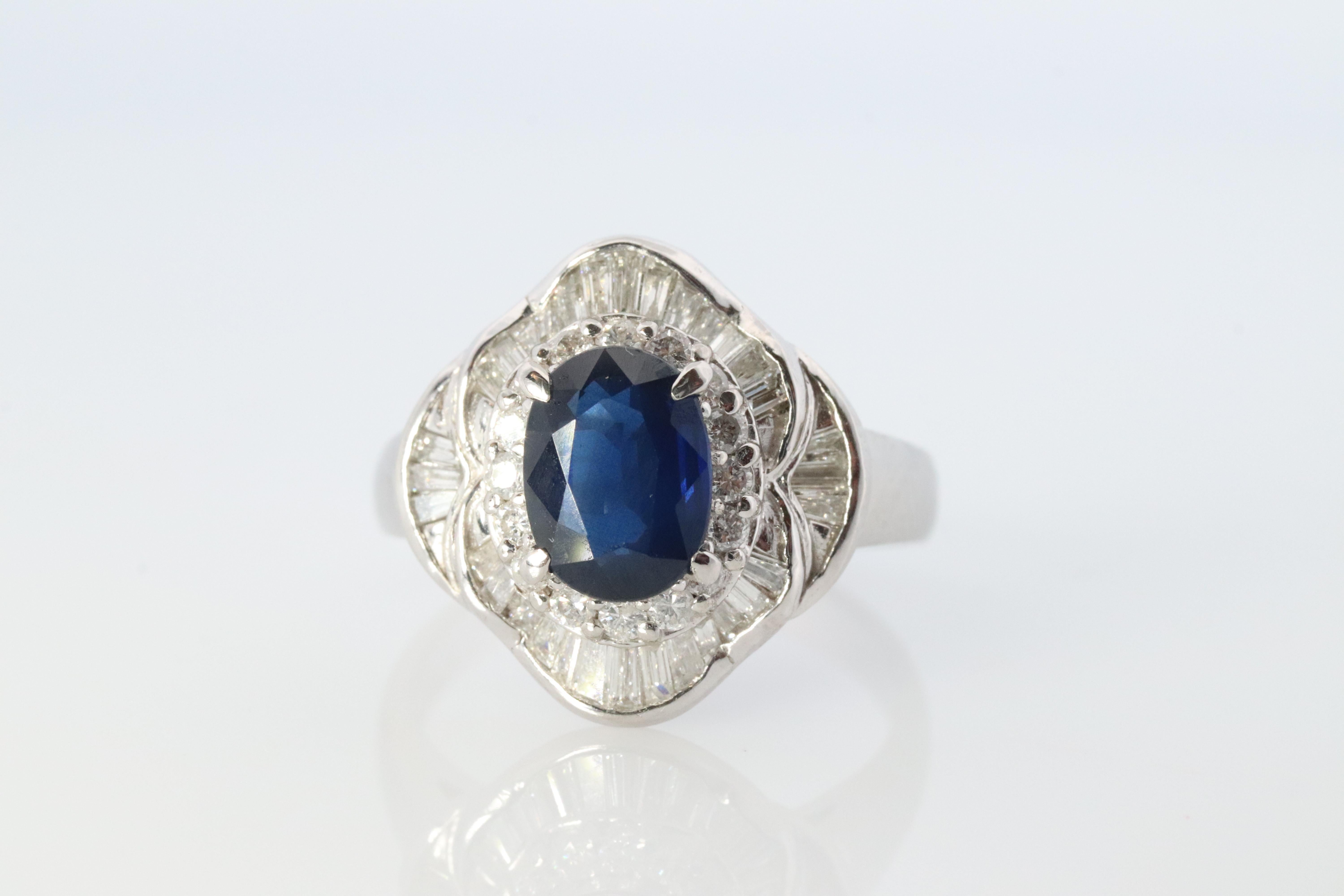 Oval Cut Sapphire and diamond Ballerina ring. Platinum Blue natural sapphire HALO ring