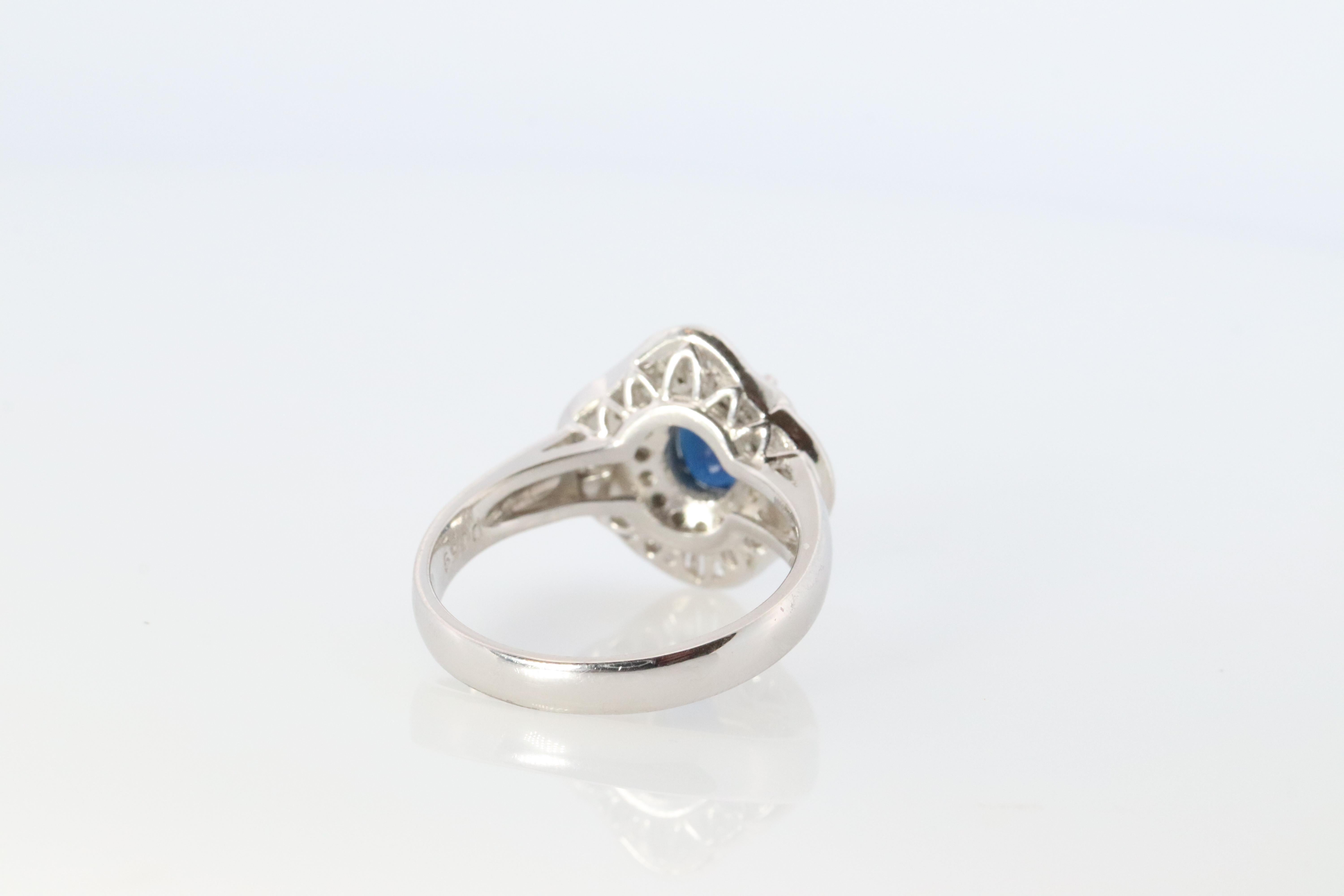 Women's Sapphire and diamond Ballerina ring. Platinum Blue natural sapphire HALO ring