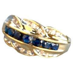 Sapphire and Diamond Band Ring .57 Carat 14 Karat Yellow Gold