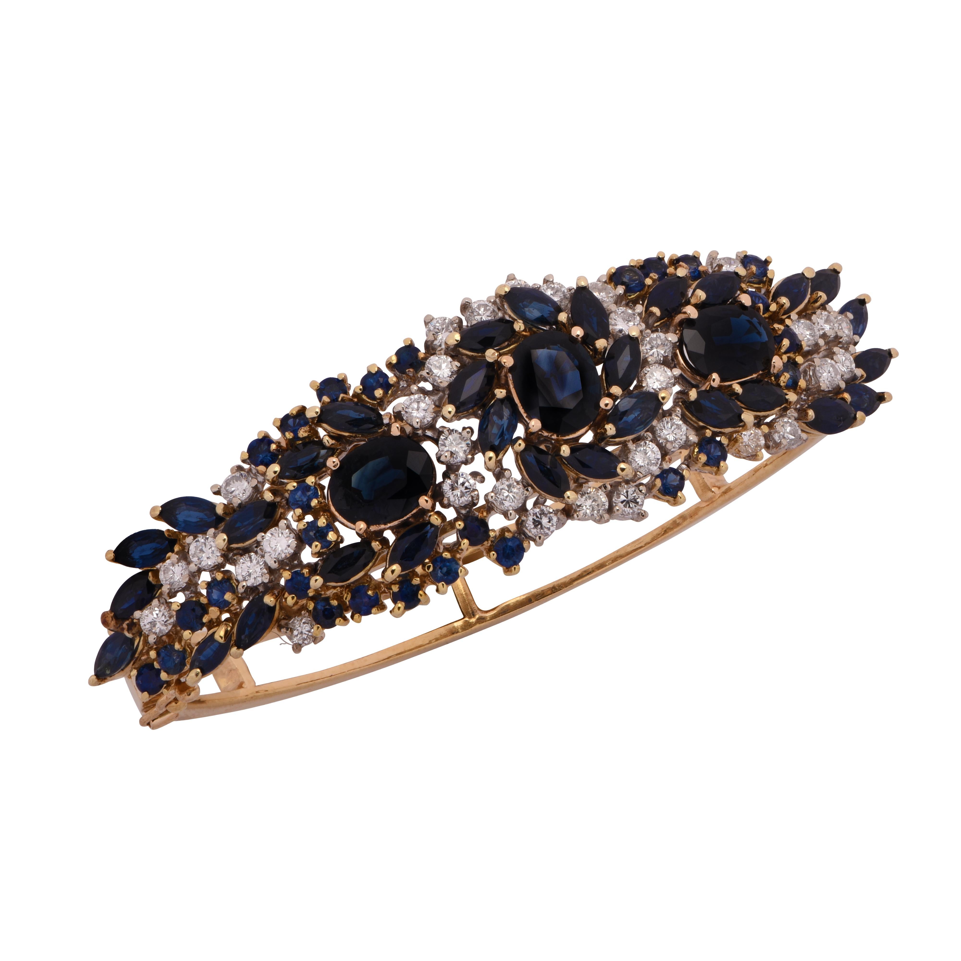 Oval Cut Sapphire and Diamond Bangle Bracelet