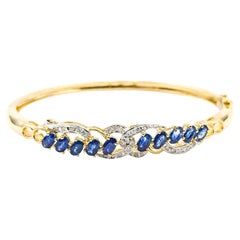 Sapphire and Diamond Bangle in 18k Yellow Gold