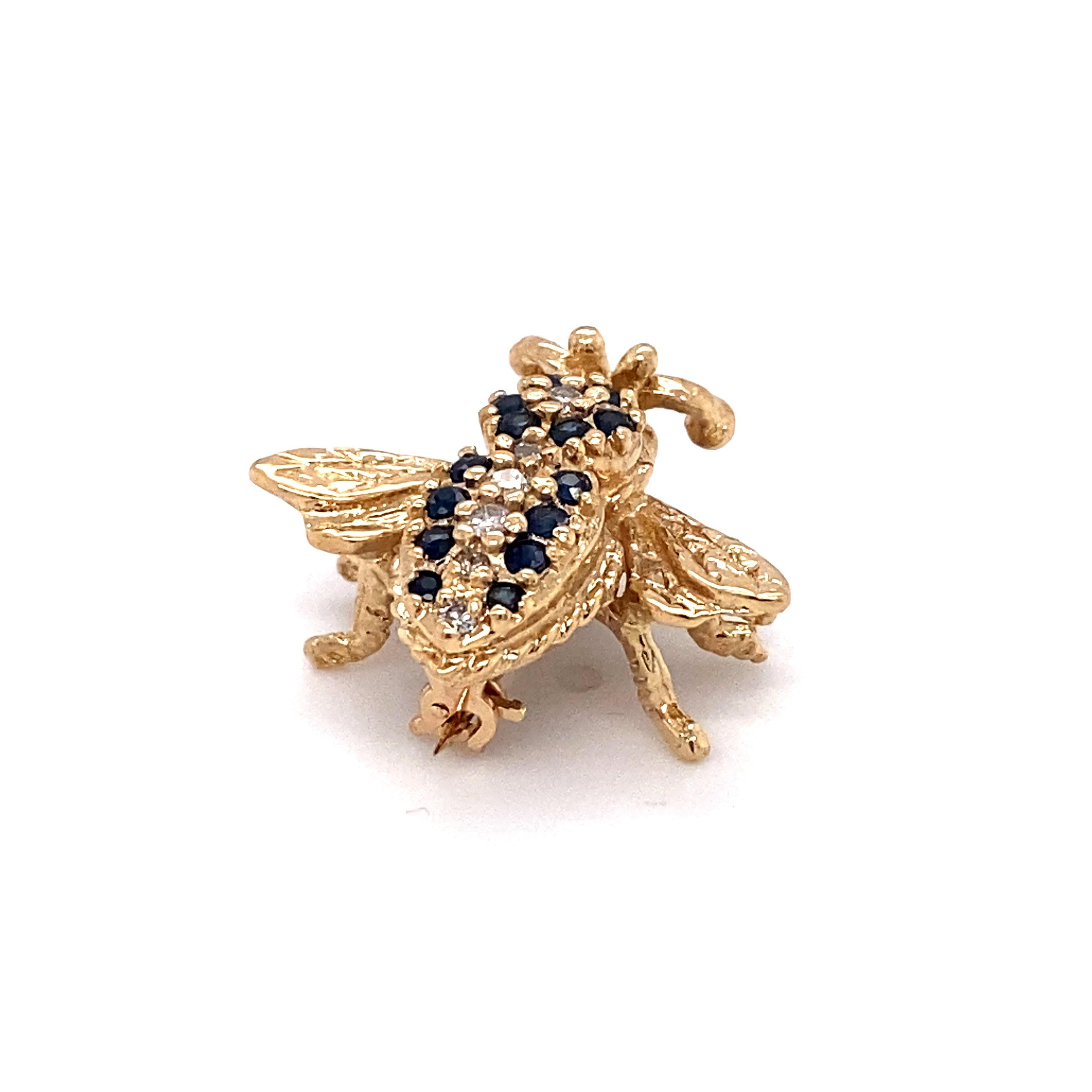 Modern Sapphire and Diamond Bee Pin in 14 Karat Gold For Sale