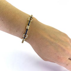 Bracciale con zaffiri e diamanti in oro giallo