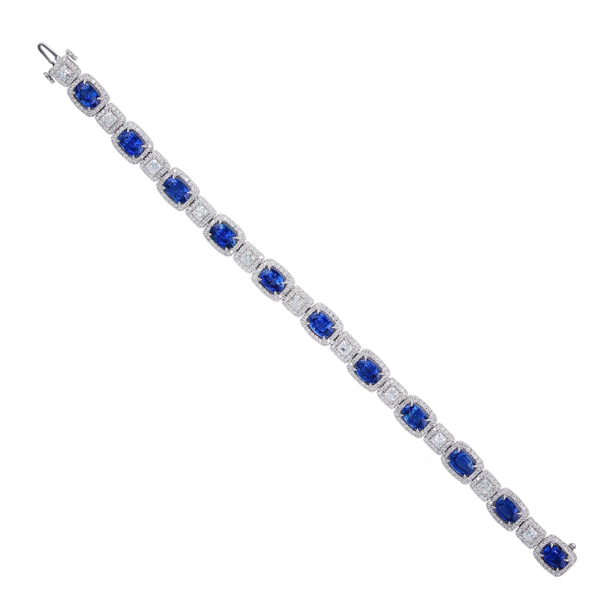 11.04 carat Oval Sapphire bracelet, alternating with 1.85 carat asscher cut diamonds, accented by 2.07 carat of round diamond halo. 

Elegant, sophisticated and perfect for any occasion, this bracelet is the perfect accessory to compliment any