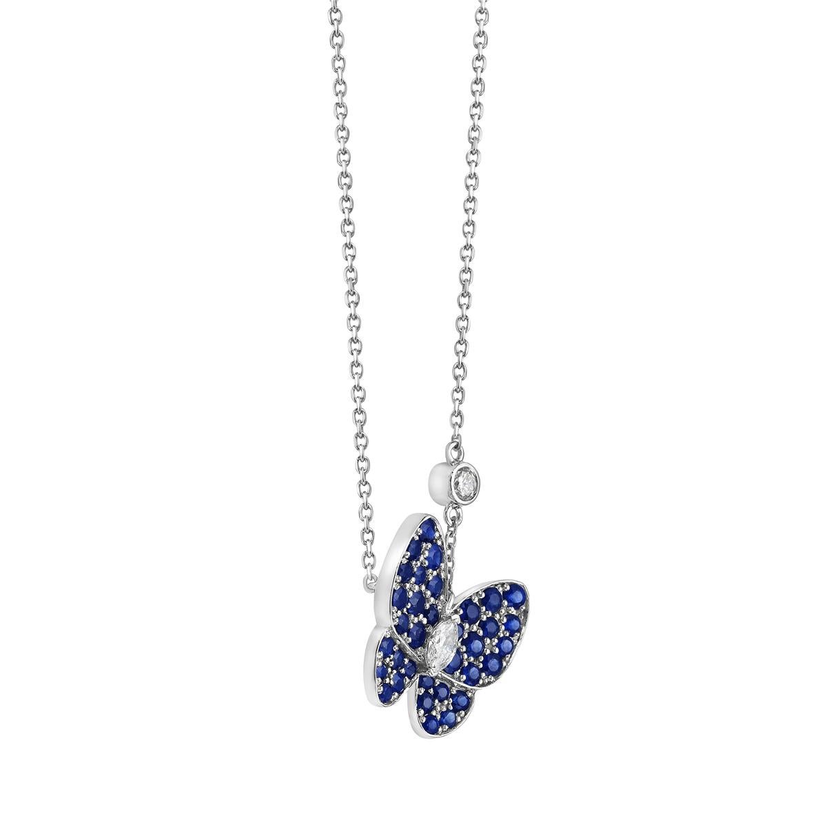 This beautiful butterfly pendant is made from 4.15 grams of 14 karat white gold. The butterfly shape is made from 34 sapphires totaling 1.17 carats with SI1-SI2, GH color diamonds. There are a total of 2 diamonds, one round and one marquise, making