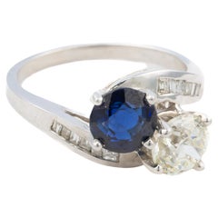 Sapphire and Diamond Bypass Baguette Cut Diamond Ring