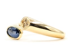 Sapphire and Diamond Bypass Ring in 18k Yellow Gold