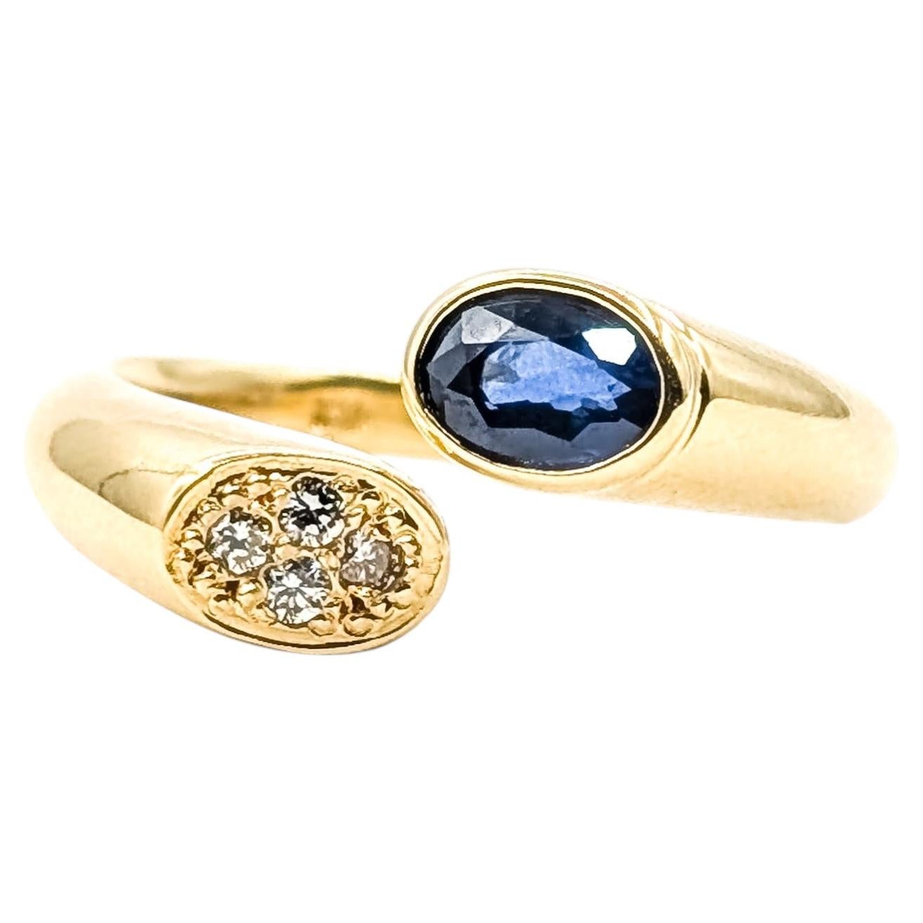 Bypass-Ring mit Saphir und Diamanten aus 18-karätigem Gelbgold