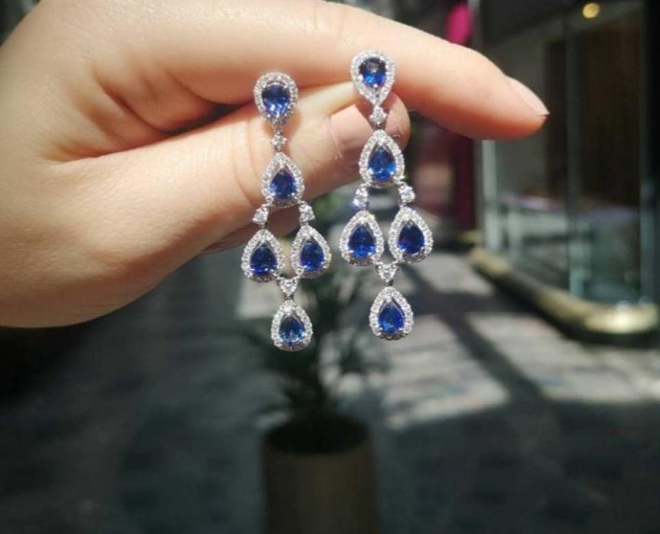 Pear Cut Sapphire and Diamond Chandelier Earrings, 18 Karat Yellow Gold For Sale
