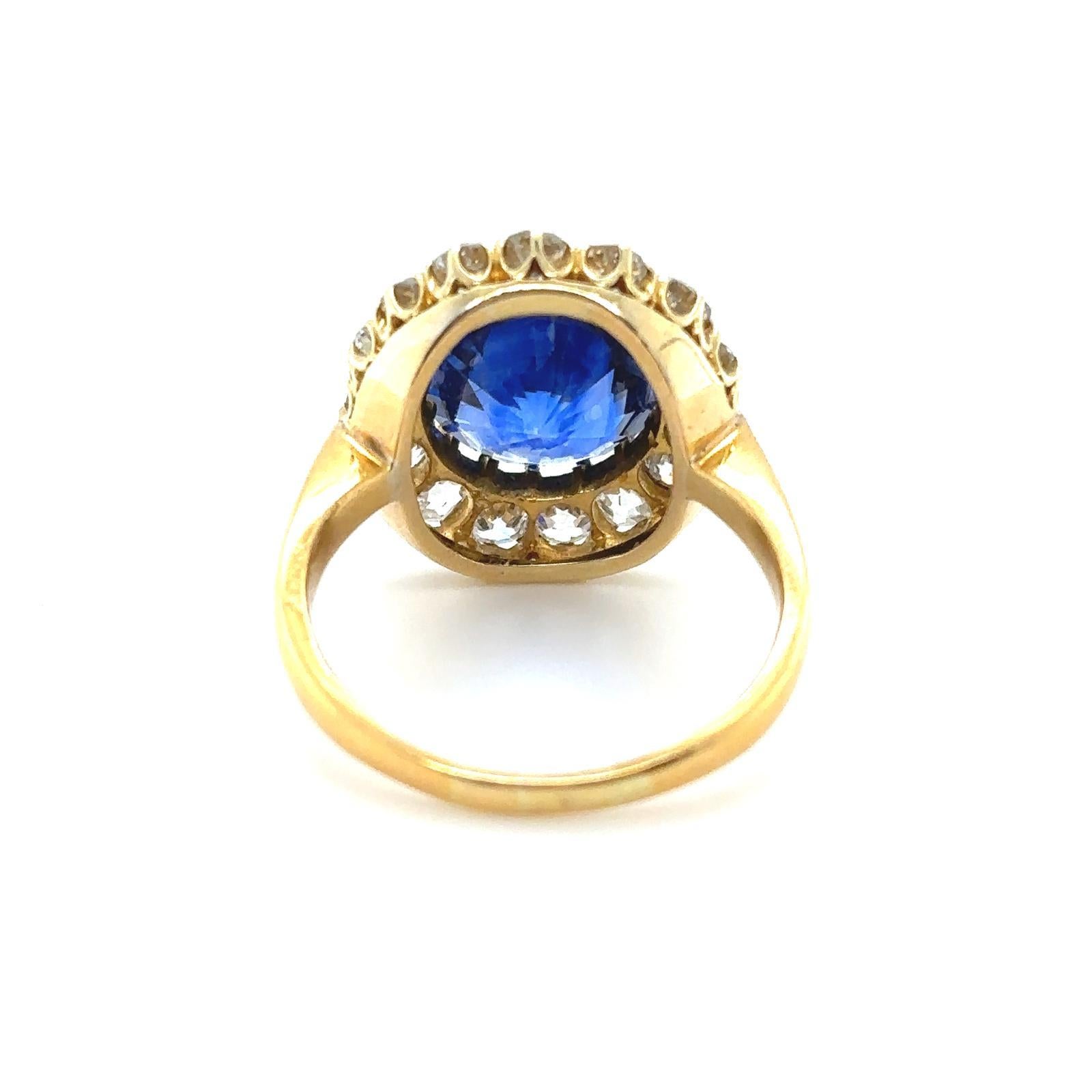 Women's Sapphire and Diamond Cluster 18 Karat Yellow Gold Ring For Sale