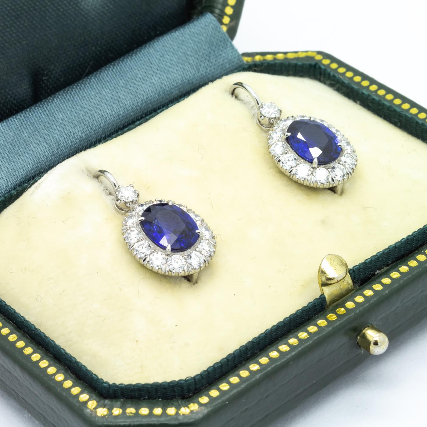 Oval Cut Sapphire and Diamond Cluster Earrings
