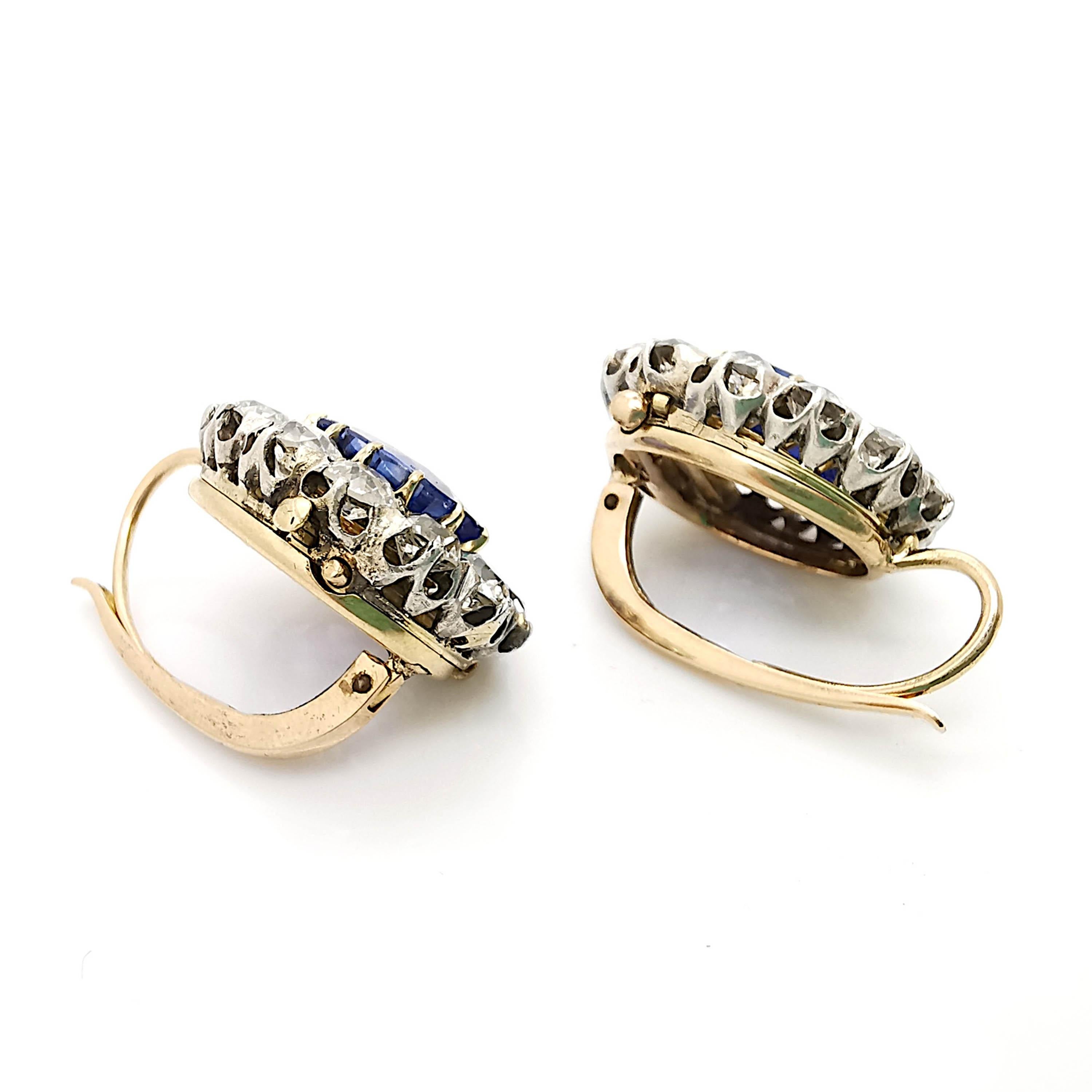 Oval Cut Sapphire And Diamond Cluster Earrings, Platinum And Gold, Circa 1890 For Sale