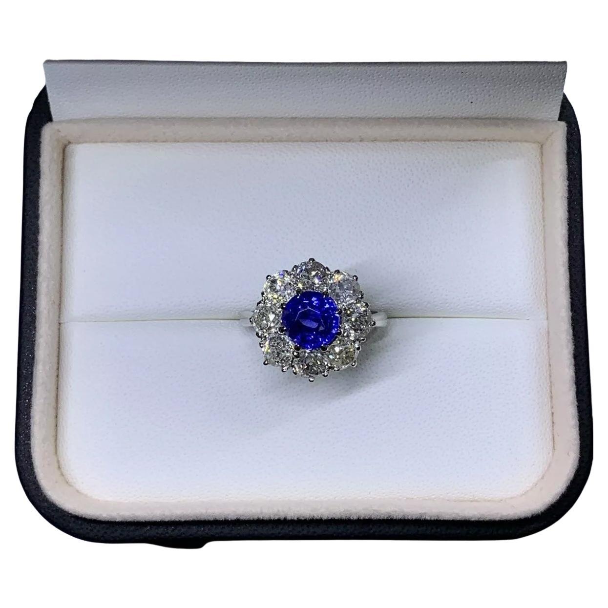 Sapphire And Diamond Cluster Engagement Ring In Platinum Antique.
