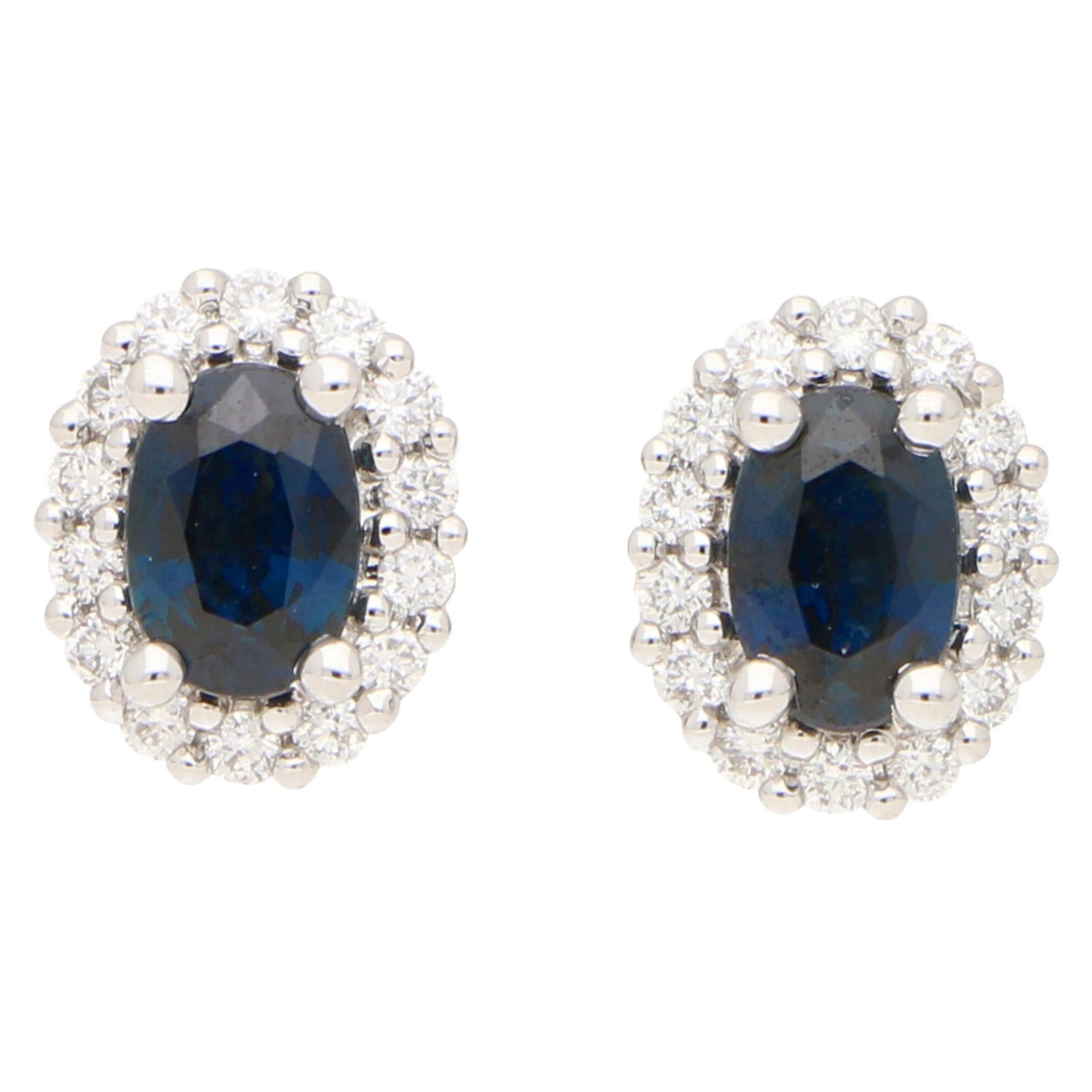 Sapphire and Diamond Cluster Halo Earrings in White Gold