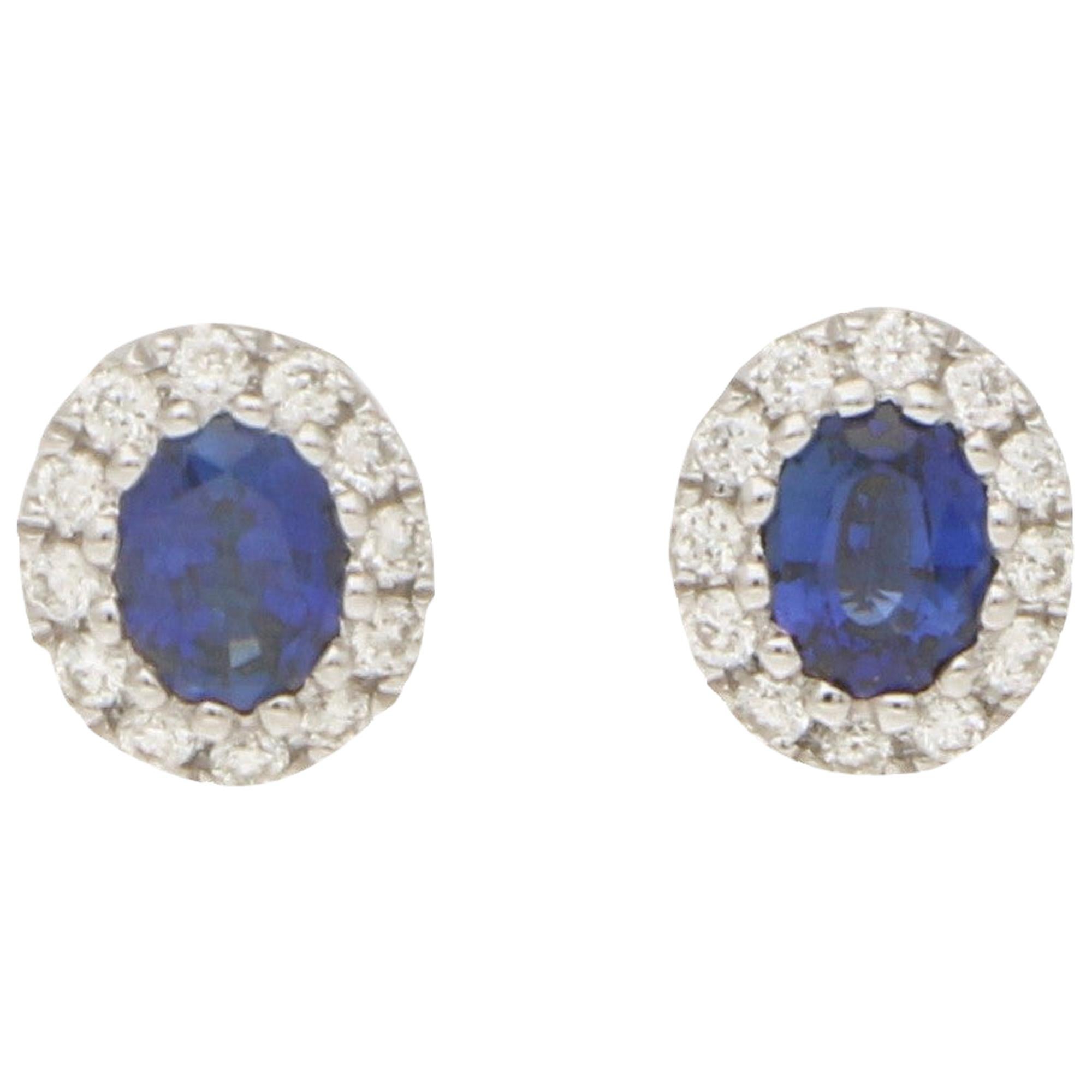 Sapphire and Diamond Cluster Halo Stud Earrings Set in 18 Karat White Gold