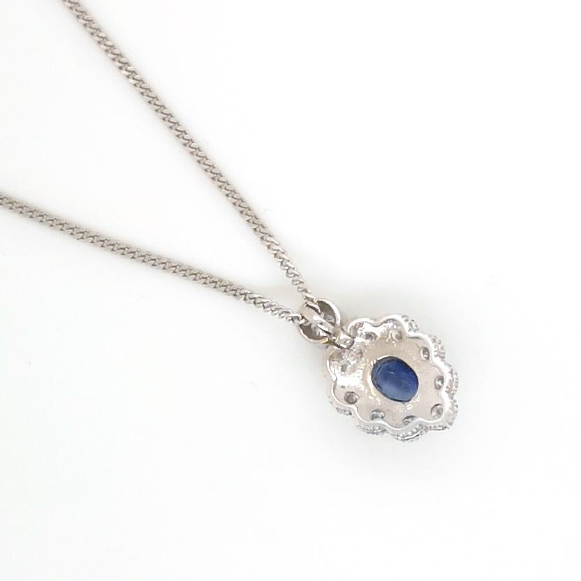 Modern Sapphire and Diamond Cluster Pendant For Sale