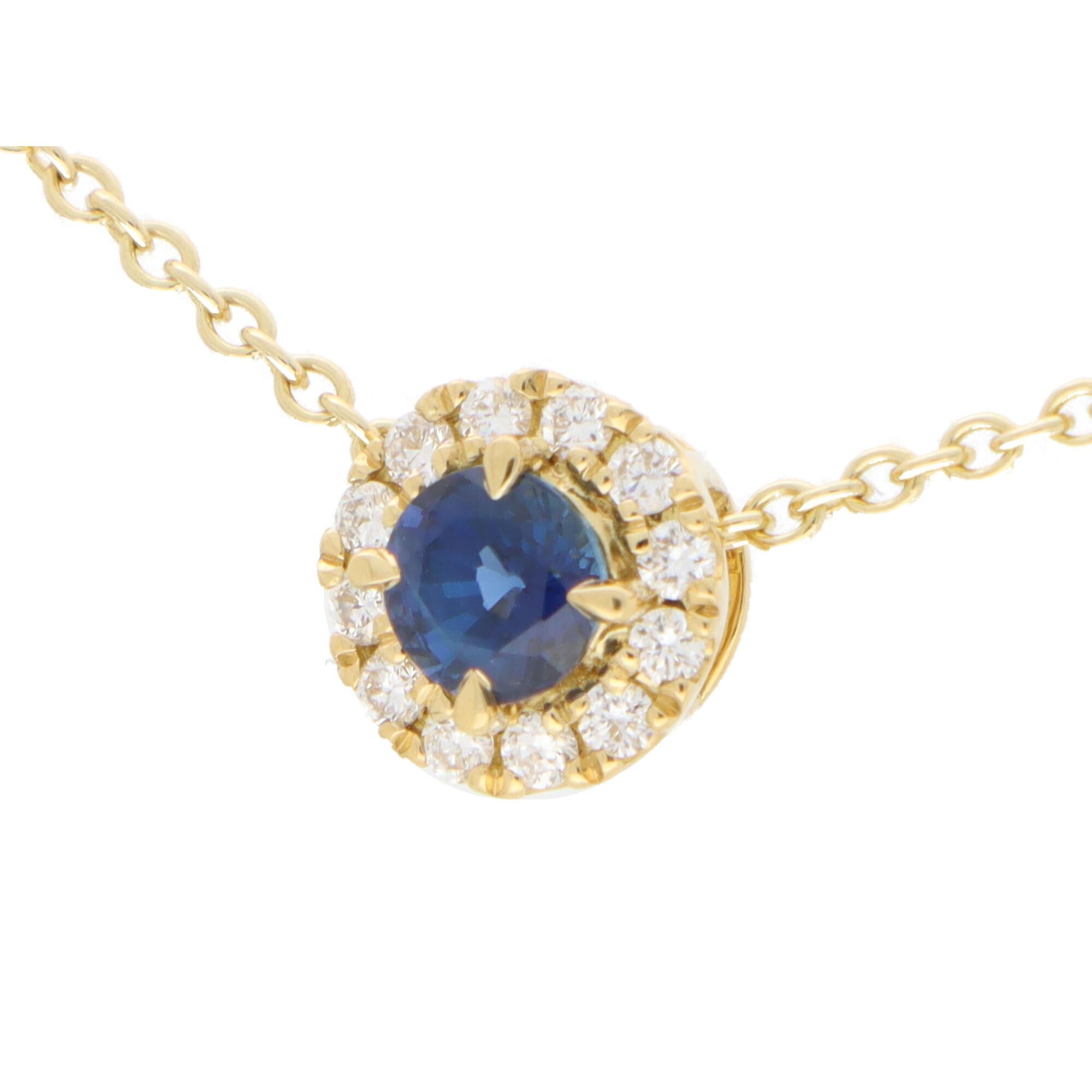 Contemporary Sapphire and Diamond Cluster Pendant Necklace Set in 18k Yellow Gold For Sale