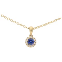Sapphire and Diamond Cluster Pendant Set in 18 Karat Yellow Gold