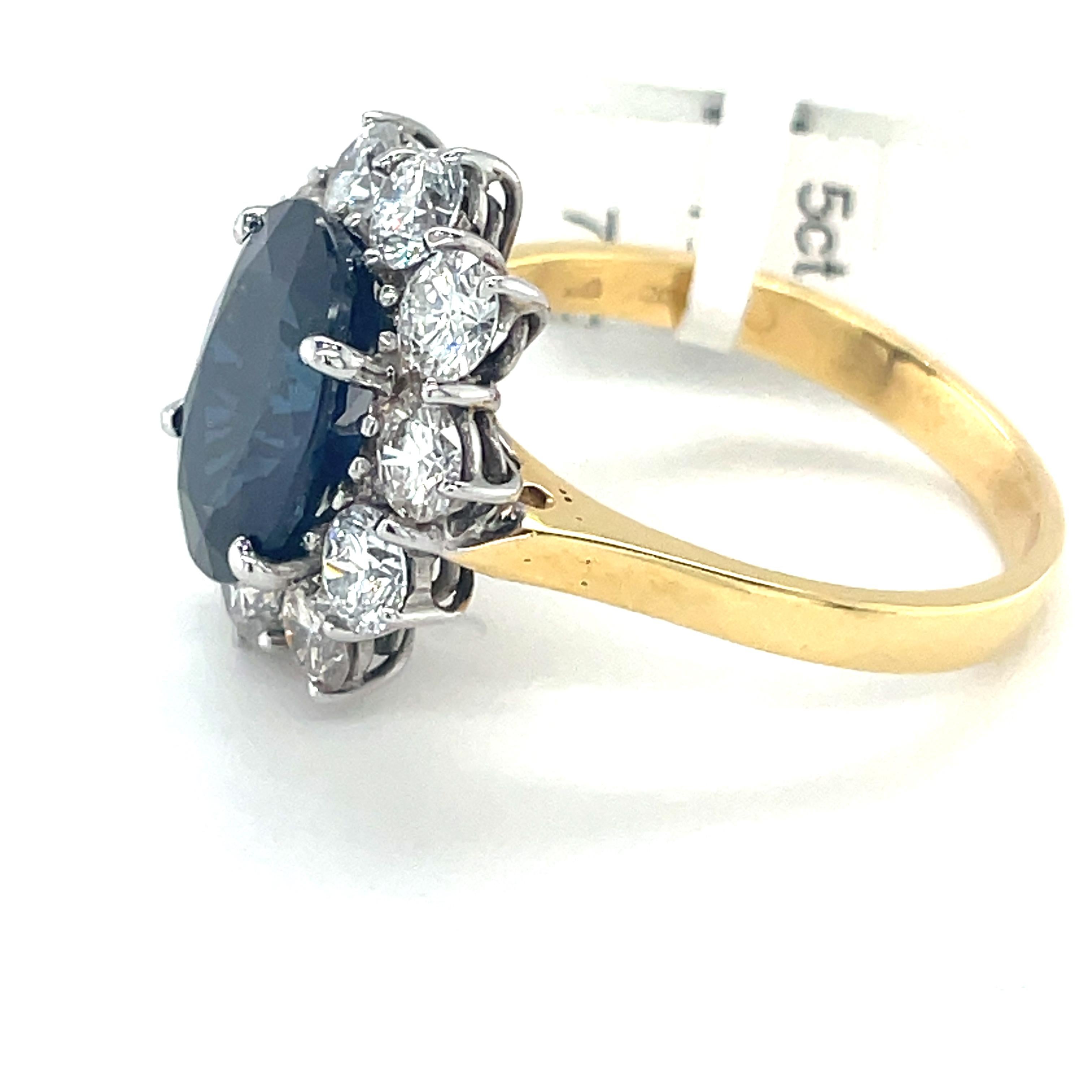 Women's Sapphire And Diamond Cluster Ring 5 carat Sapphire & 2.35 Carat Diamonds For Sale