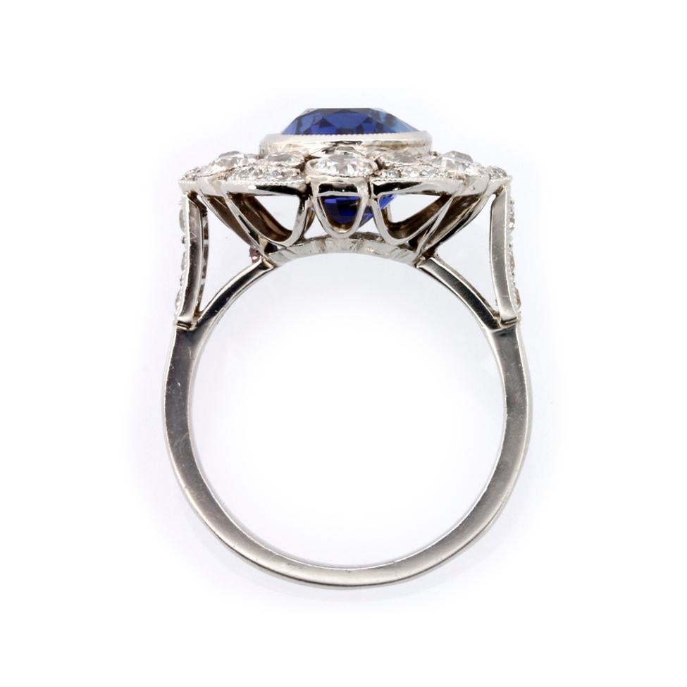 Oval Cut Sapphire and Diamond Cluster Ring