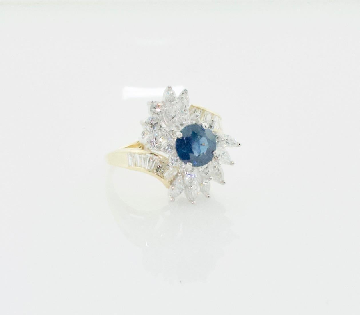 Sapphire and Diamond Cocktail Ring by Terrell & Zimmelman Circa 1970's

Indulge in the ultimate expression of luxury with the Lady's 18K Yellow & White Gold Sapphire/Diamond 